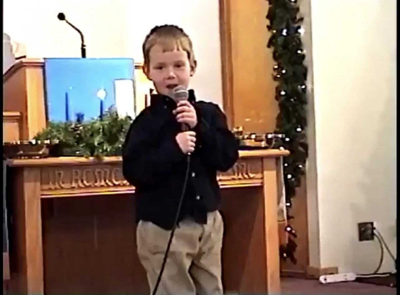 clint westwood as a child, performing in church