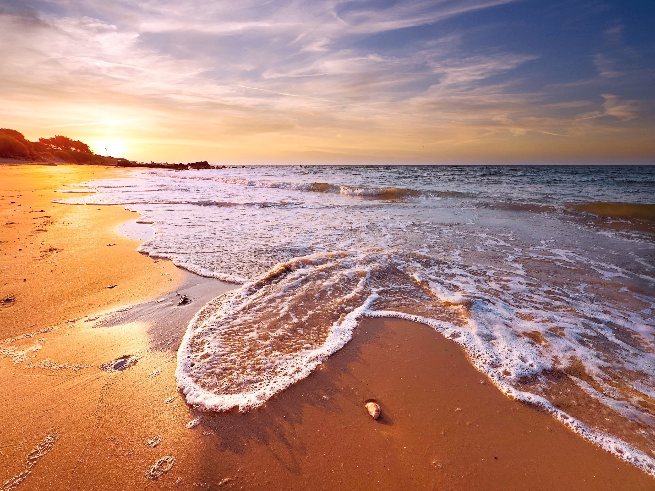 "Beach Bubble" Taken on Carnac Plage, France, capturing the morning sunrise and the golden rays of sun. The approaching tide leaving its mark on the soft sand, every wave telling a story with its crystal clear Aqua. This is a sister picture to "Beach