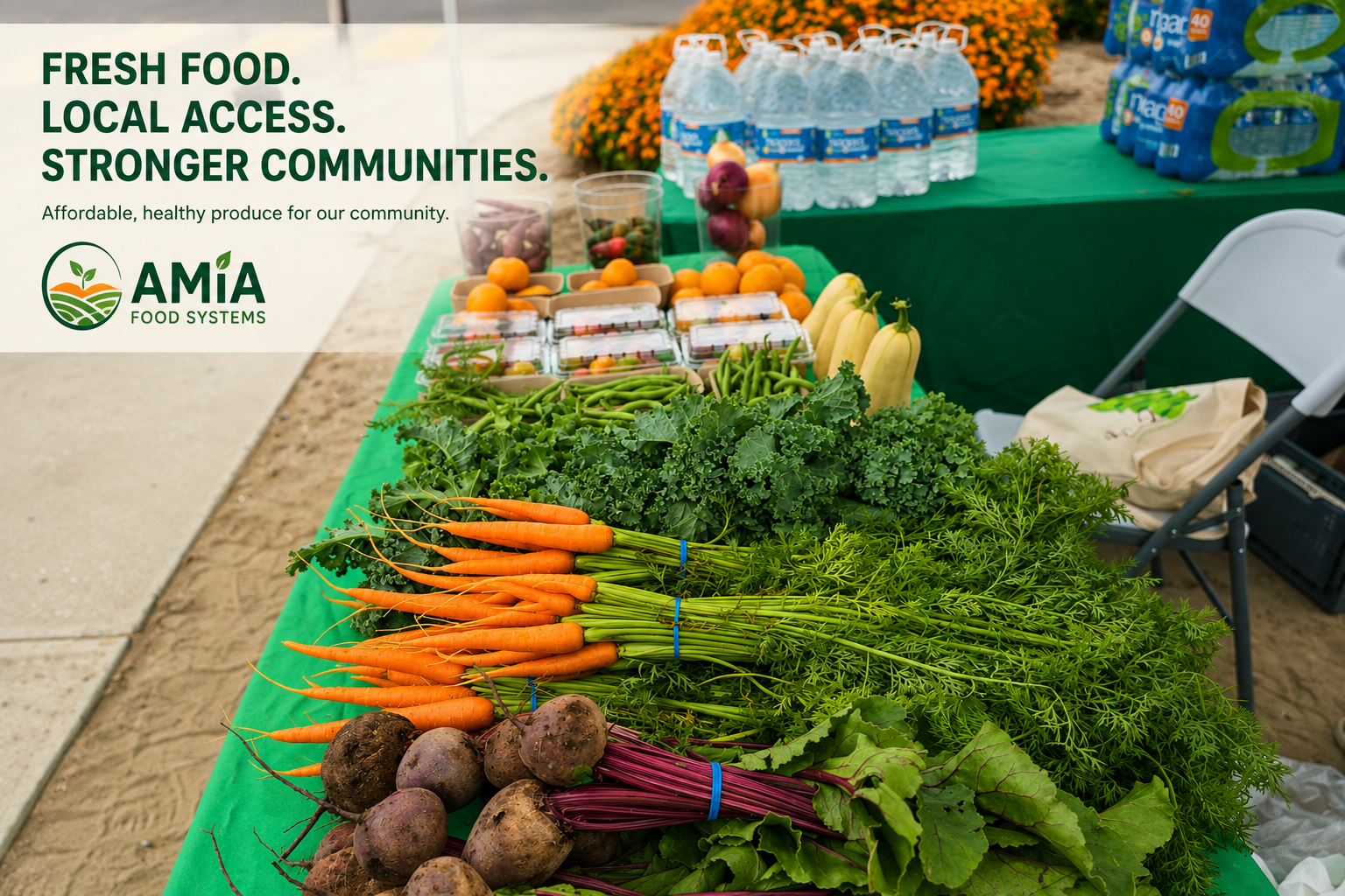 Fresh vegetables and bottled water displayed on a green table at an outdoor farmers market, with a logo and text promoting local, healthy produce for stronger communities.