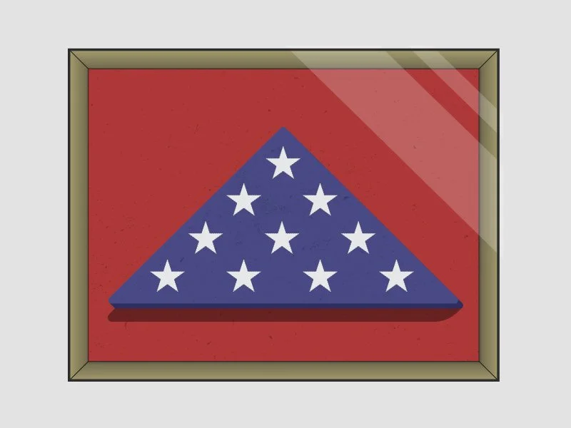 A framed artwork of a stylized American flag with a blue triangle and white stars on a red background.