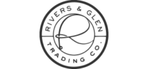A circular logo with text around the edge and a stylized whale in the center.