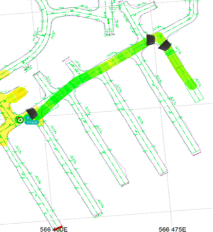 Map showing a road with a color gradient from yellow to green, indicating traffic flow, with black markers at both ends.