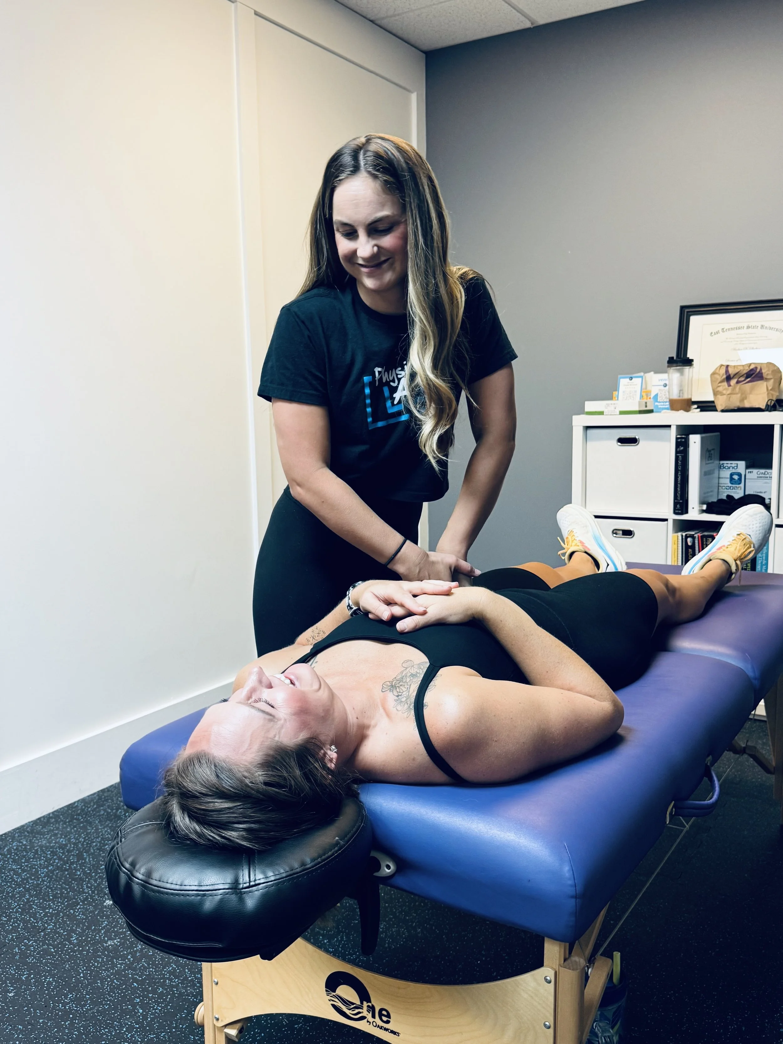 Raine Rackley, PT, DPT, working on a patient at an event