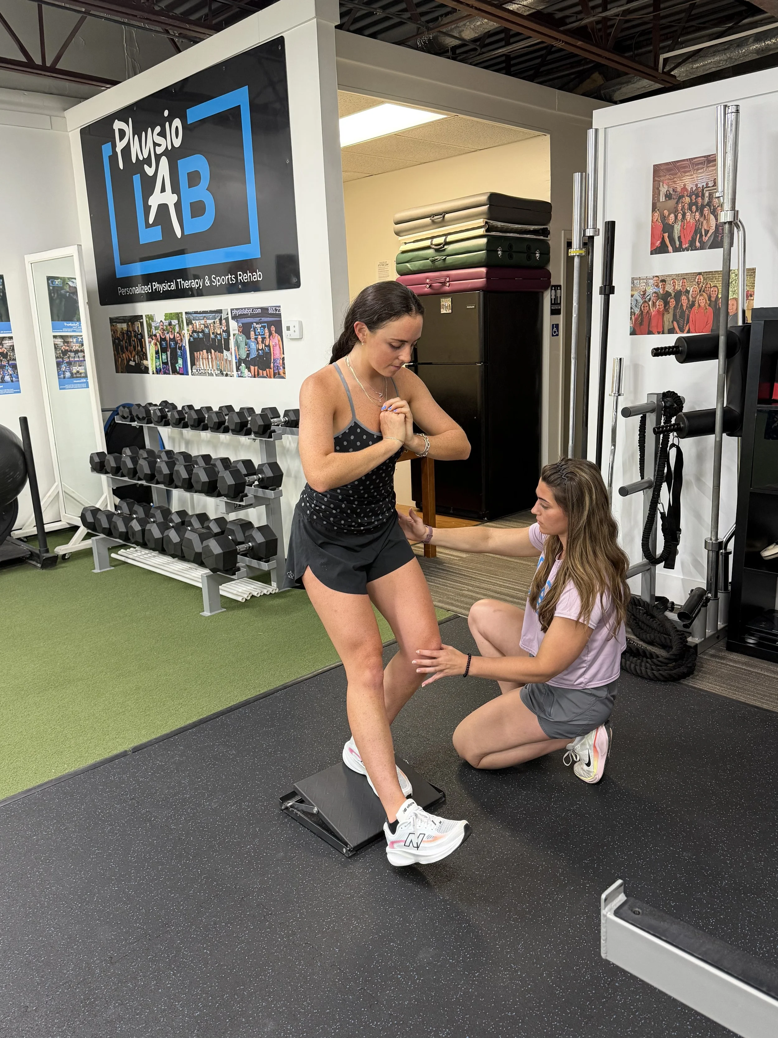 Bre Robinson, PT, DPT, working with a patient