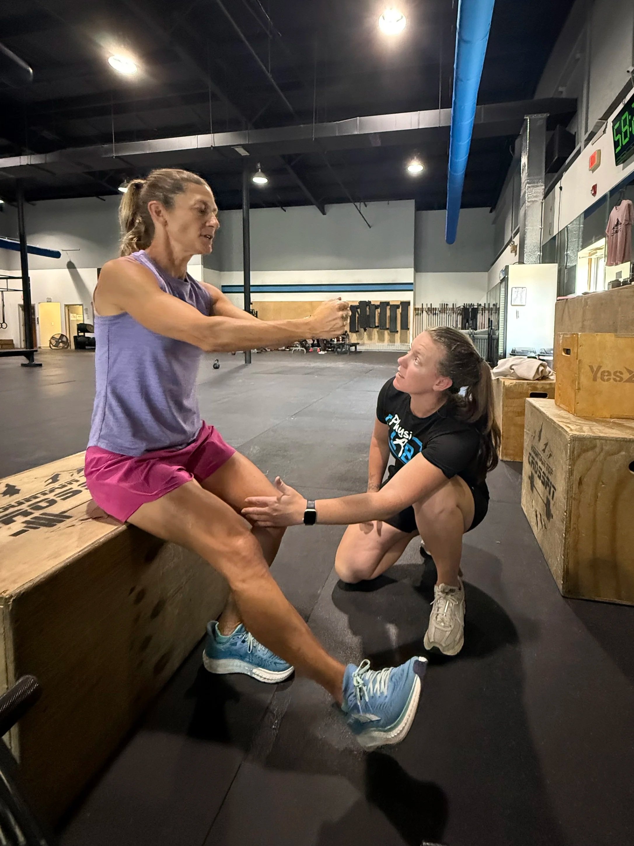 A PT working with a patient