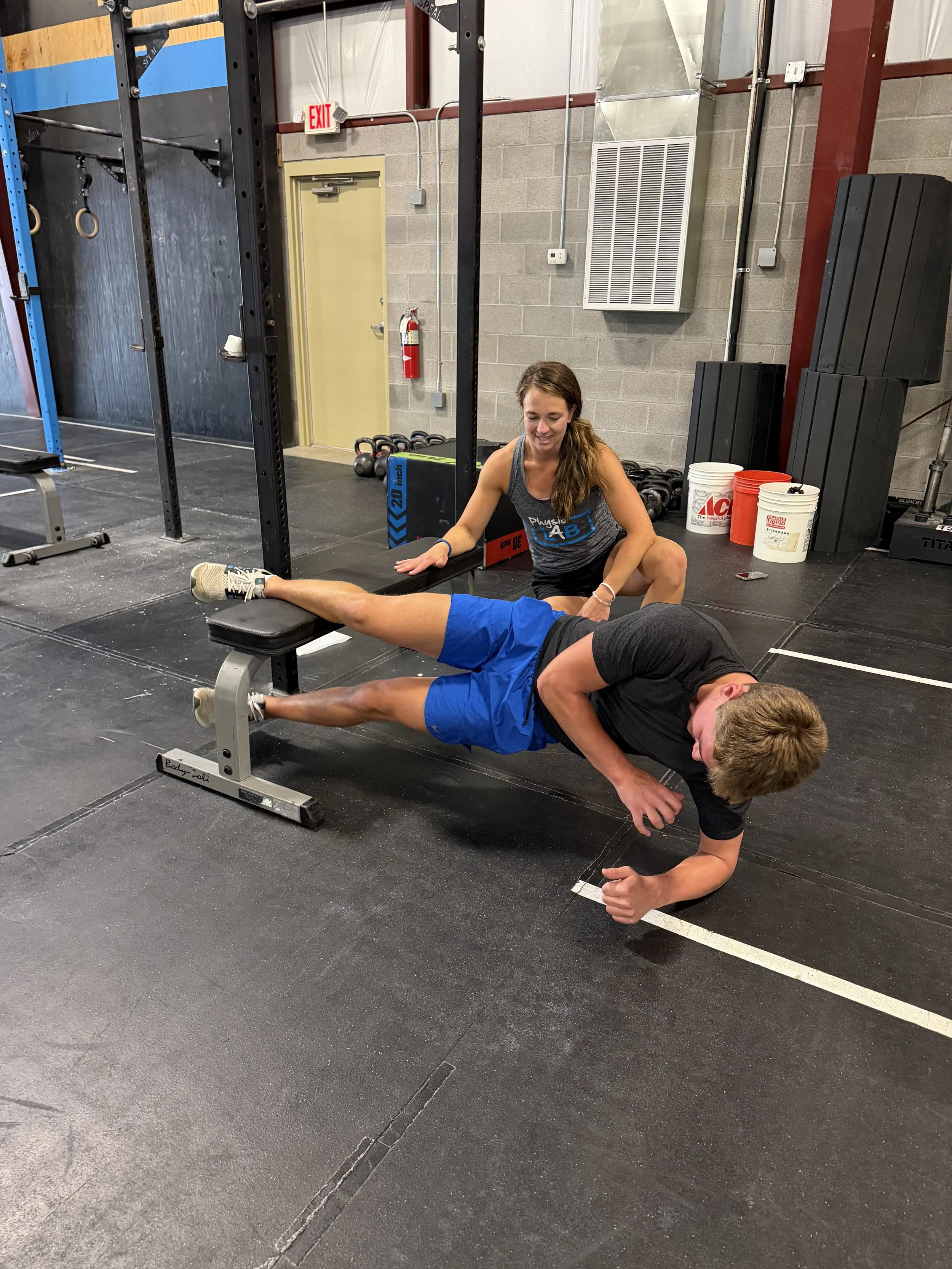A PT working with a student athlete