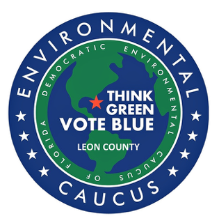 Circular logo for environmental caucus with a green and blue color scheme, featuring a map of Florida in the center, surrounded by text promoting the Democratic Environmental Caucus, encouraging voting for Green and Blue, with mentions of Leon County.