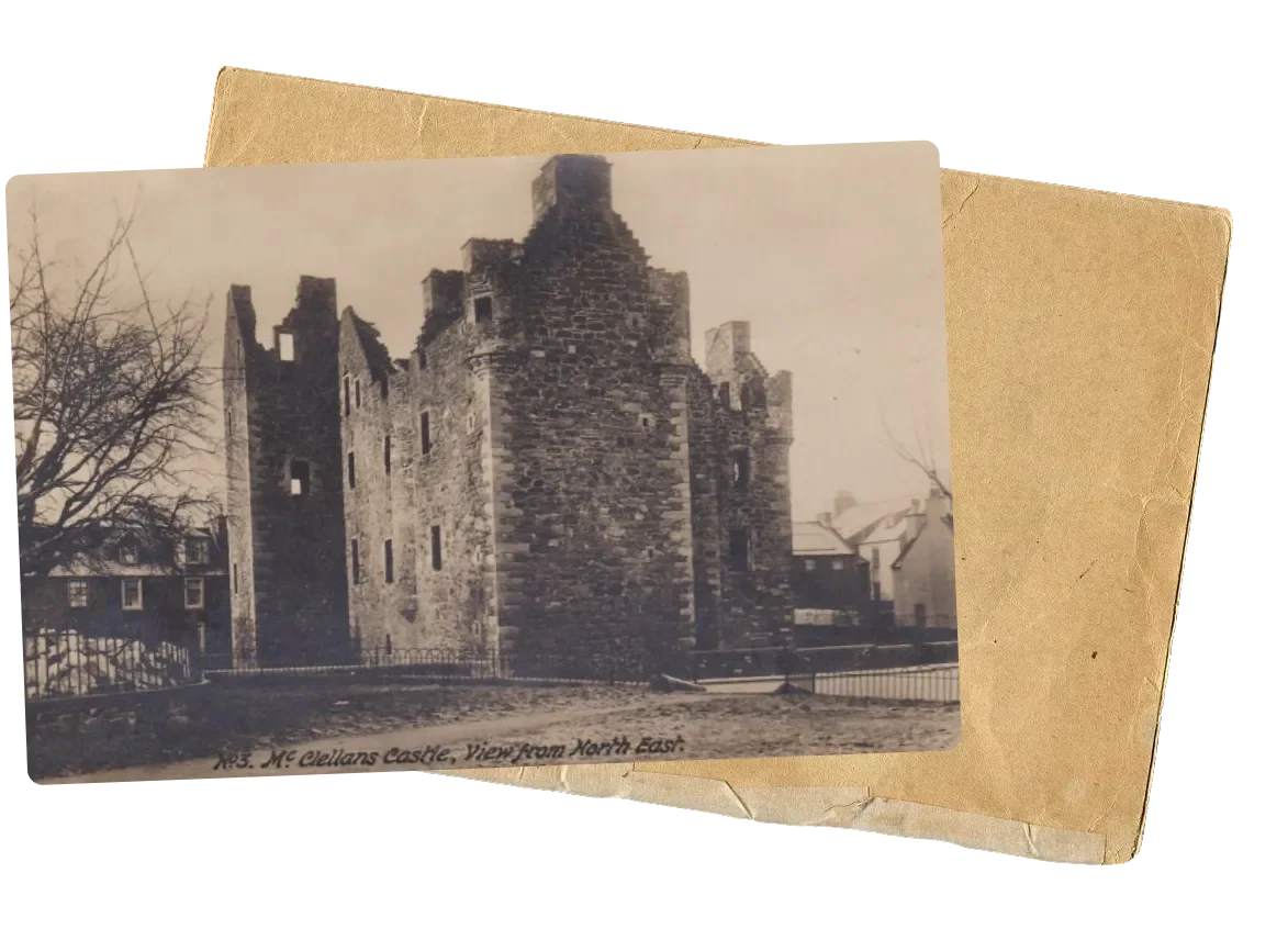 Vintage black and white photograph of McClellan's Castle viewed from the north-east, with surrounding trees and nearby buildings.