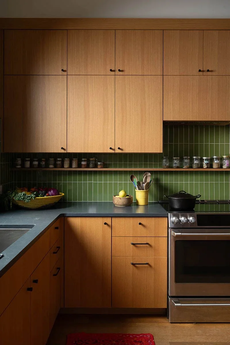 rainbow-in-the-woods-susan-yeley-kitchen-green-tile-oven.webp