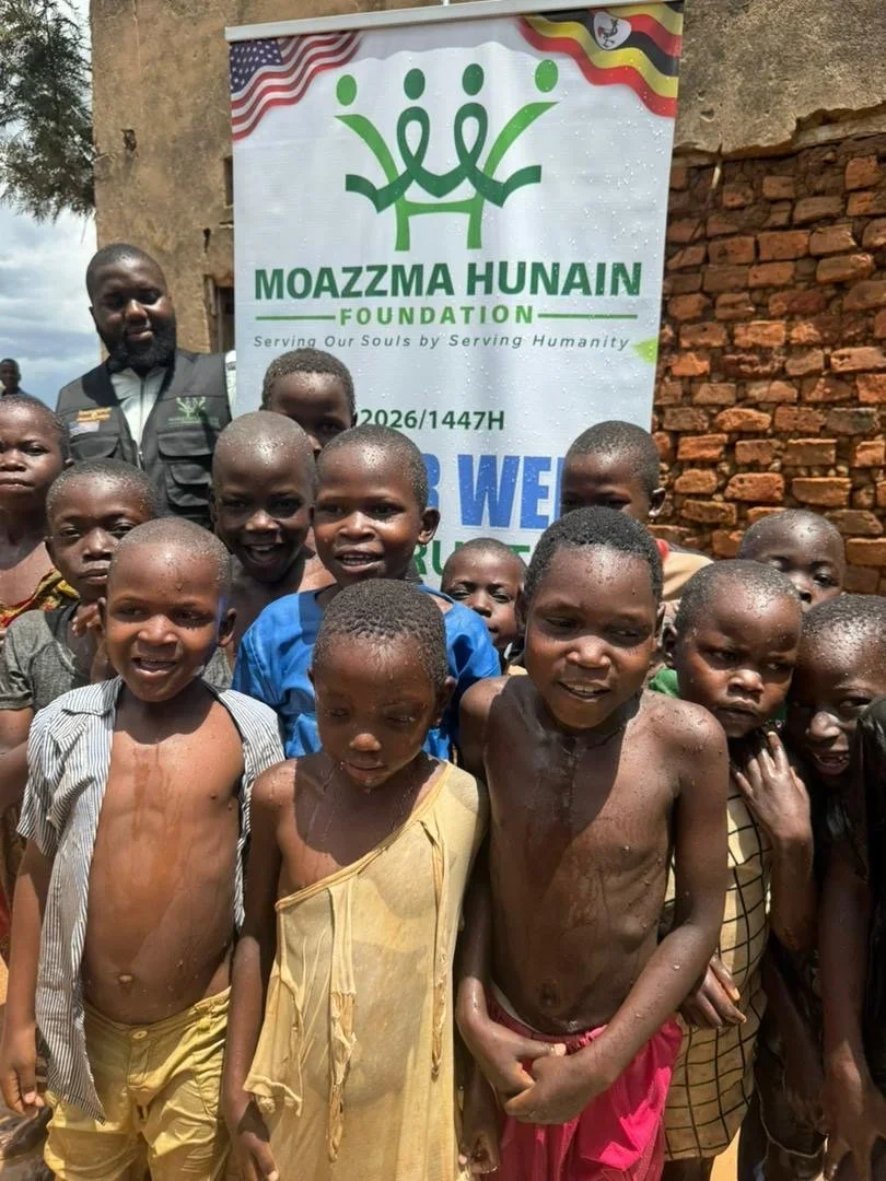 Moazzma Hunain Foundation- impact in Uganda. Children and villagers celebrate the completion of clean water project by Moazzma Hunain Foundation across remote areas in Uganda.