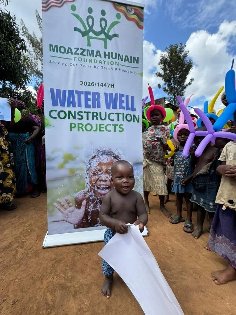Moazzma Hunain Foundation- impact in Uganda. Children and villagers celebrate clean water project initiative by Moazzma Hunain Foundation across remote areas in Uganda.