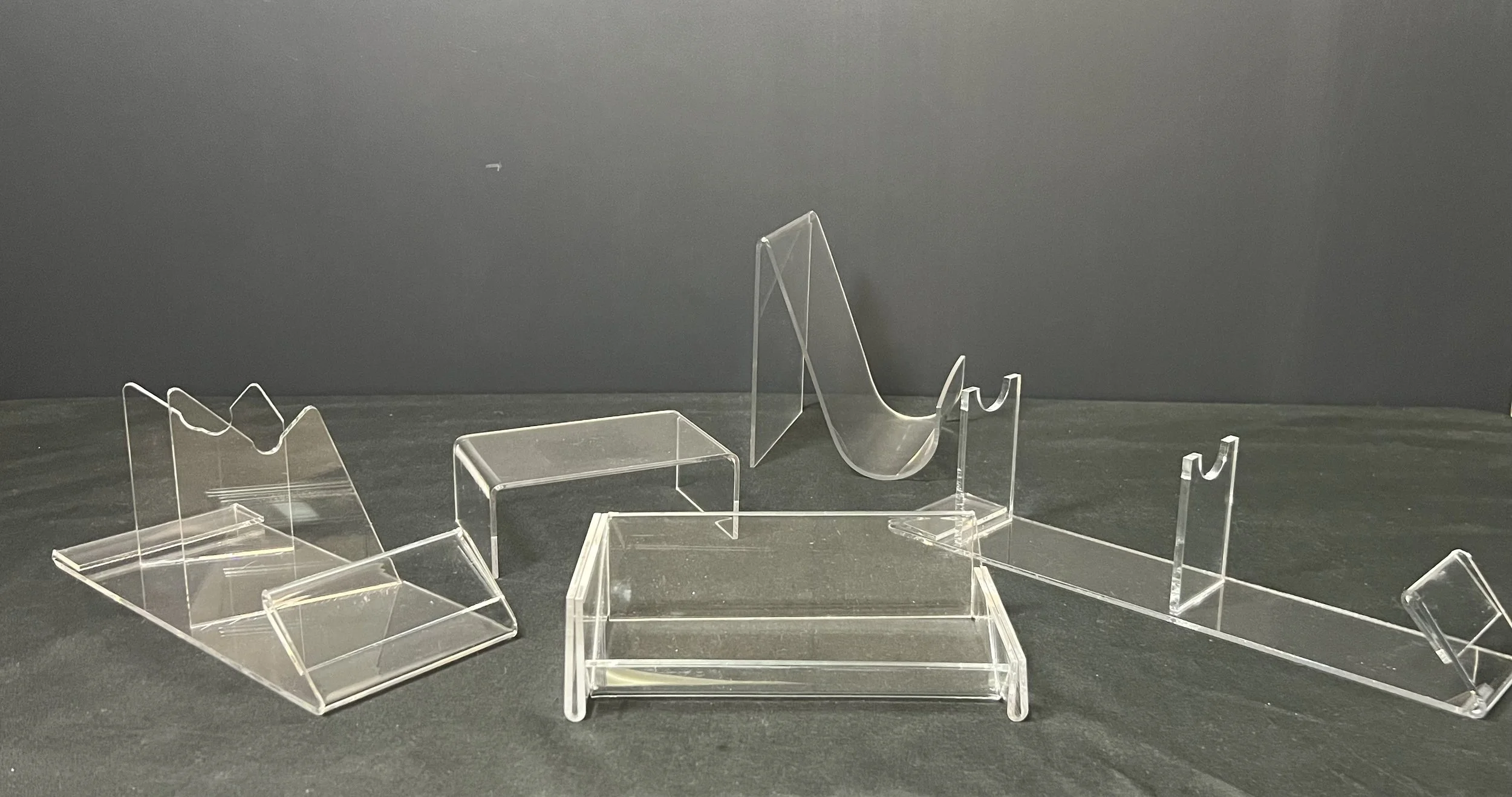 Custom acrylic display stands and risers fabricated by RJ Plastics in Northwood Ohio