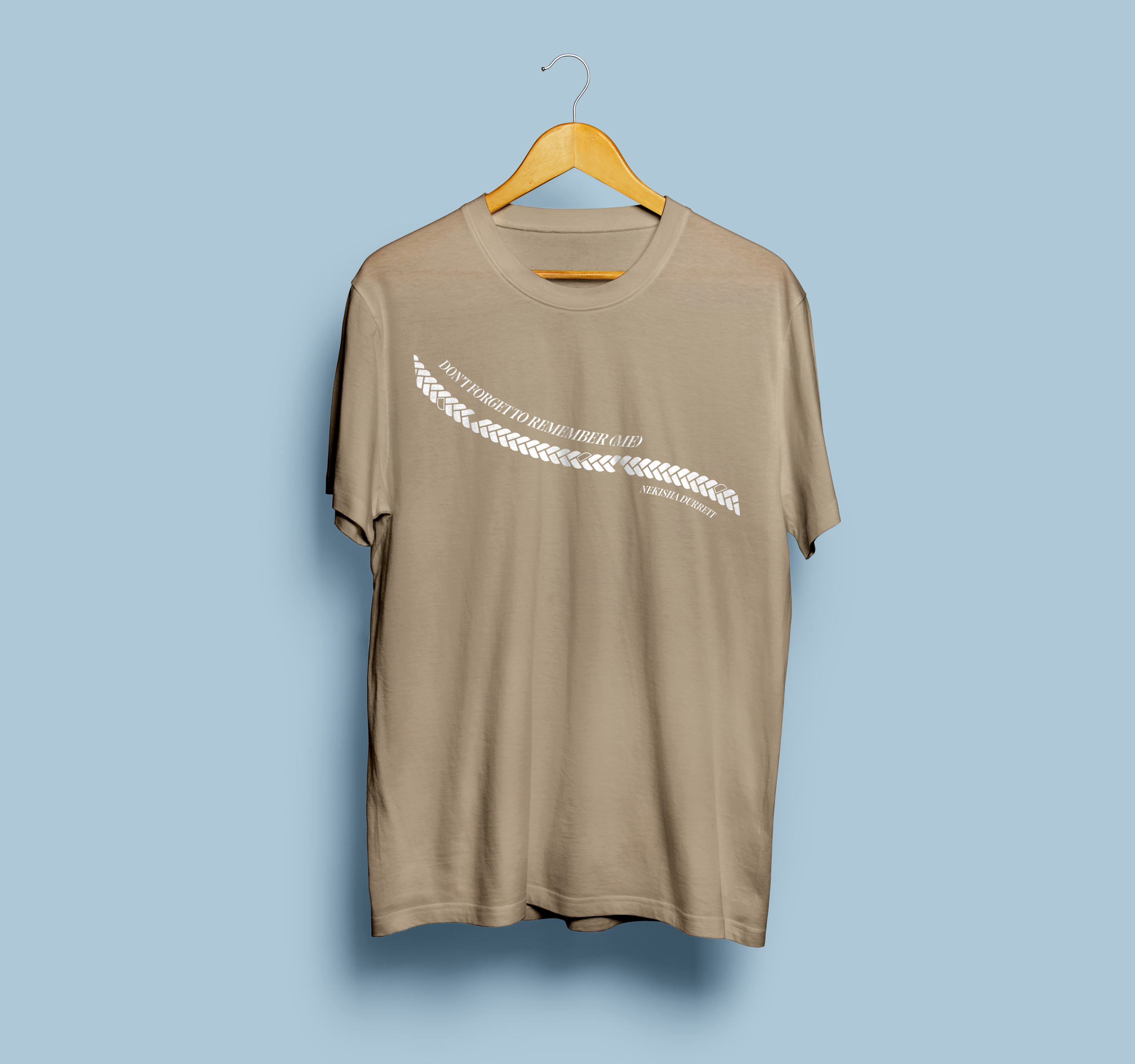 Mockup of a T-Shirt design inspired by artist Nekisha Durrett's "Don't Forget to Remember (Me)"