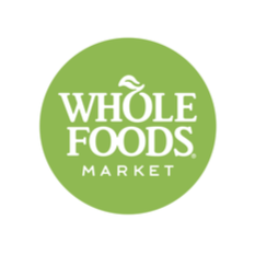 Whole Foods Market logo on a green circle background.