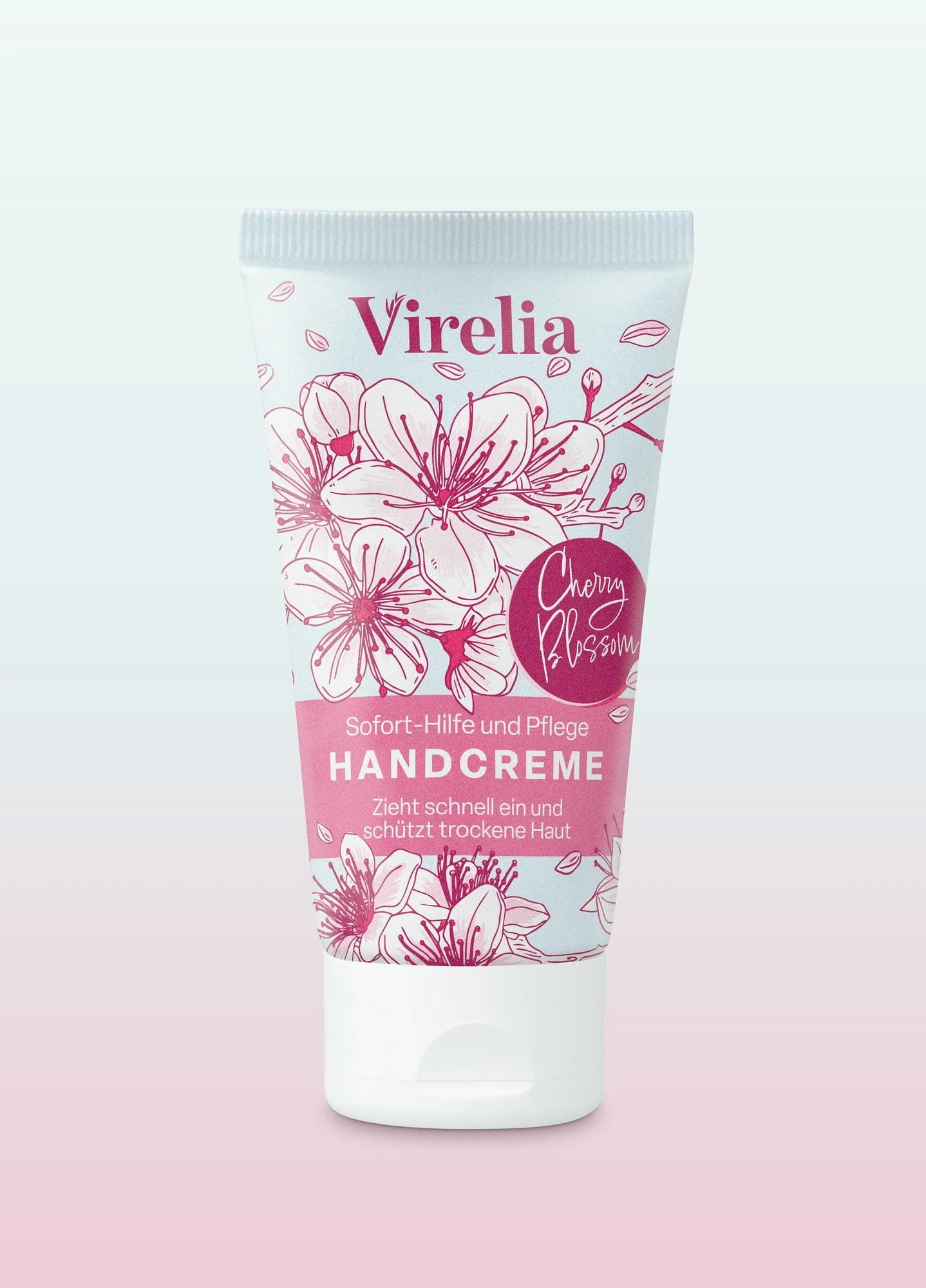 Eine Tube Handcreme mit einem blühenden Kirschblütenmotiv und rosa Schrift auf weißem Hintergrund.