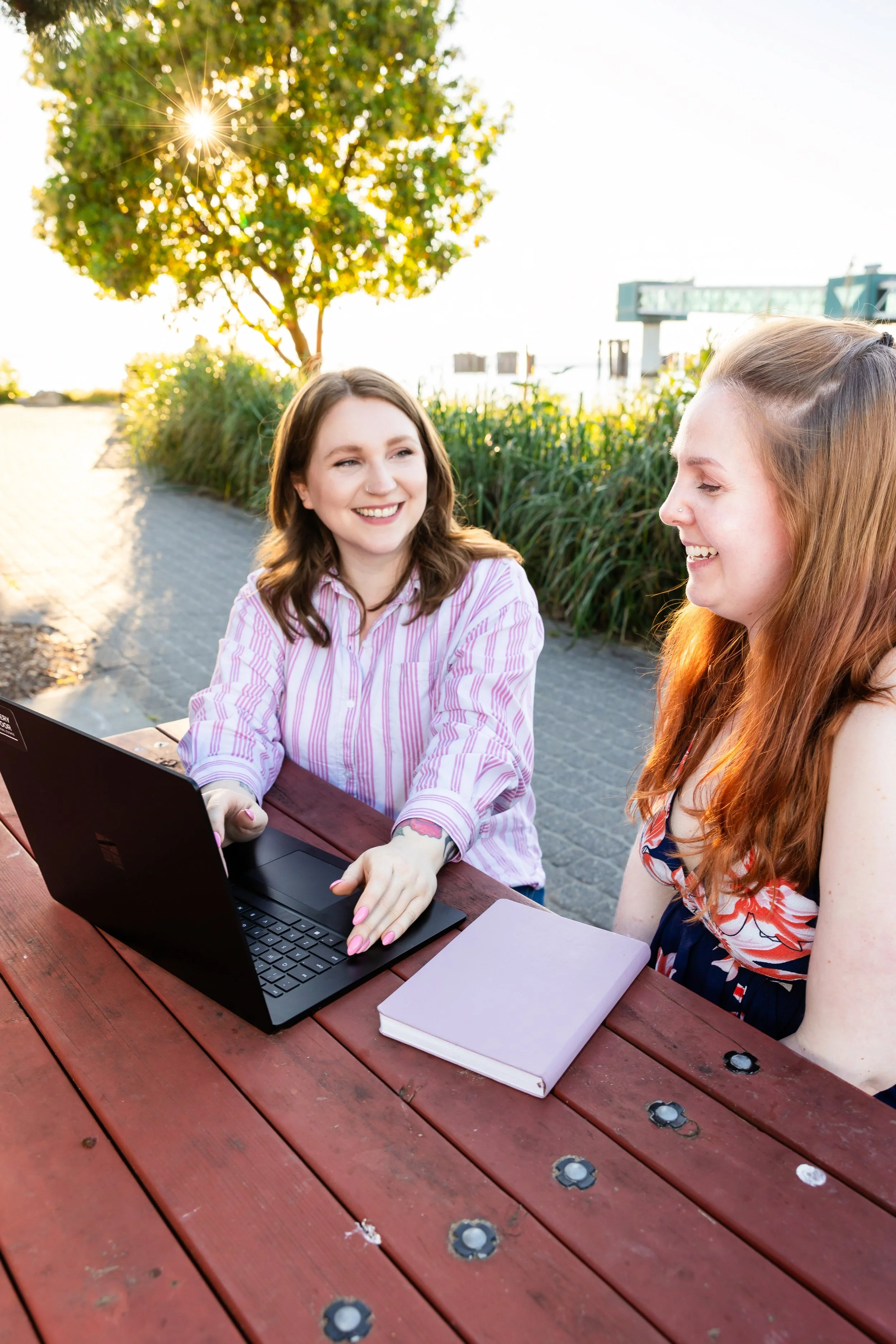 A real estate broker and her friend talking about the best neighborhoods in Snohomish County
