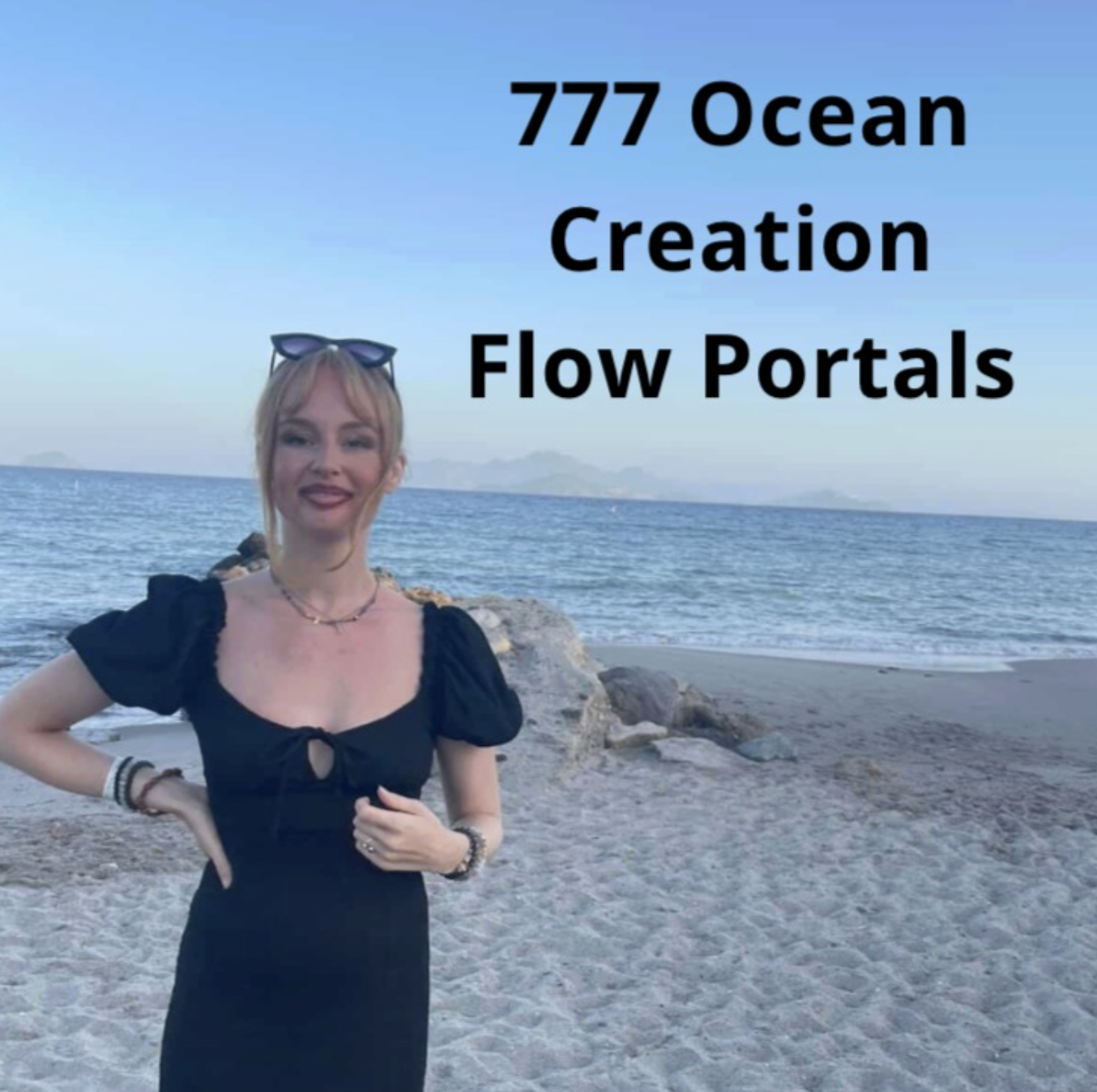 A woman in a black dress standing on a beach with rocks and the ocean in the background, with text overlay that reads '777 Ocean Creation Flow Portals'