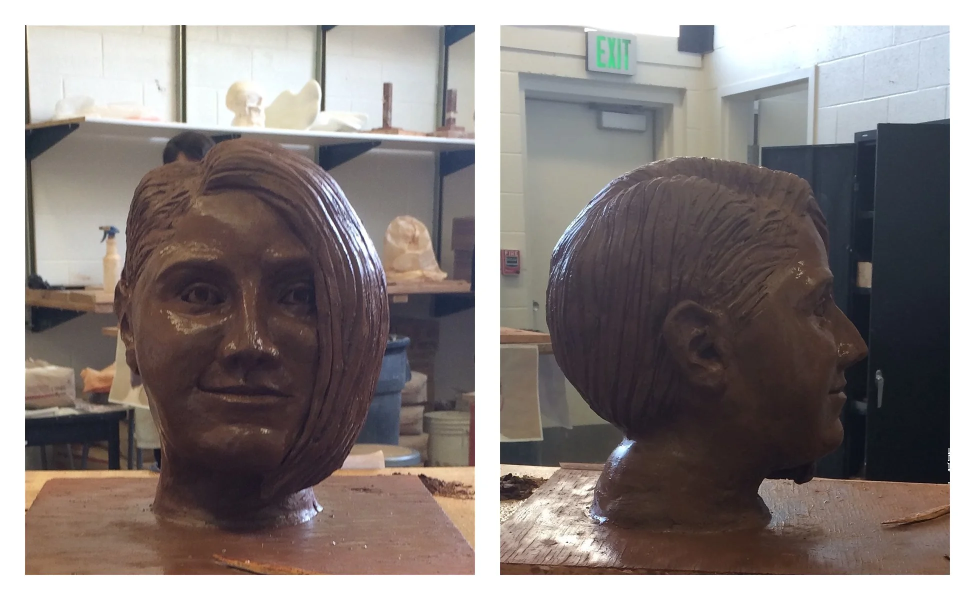 A wooden sculpture of a woman's head, showing a front view on the left and a side view on the right, in an artist's studio with shelves and supplies in the background.