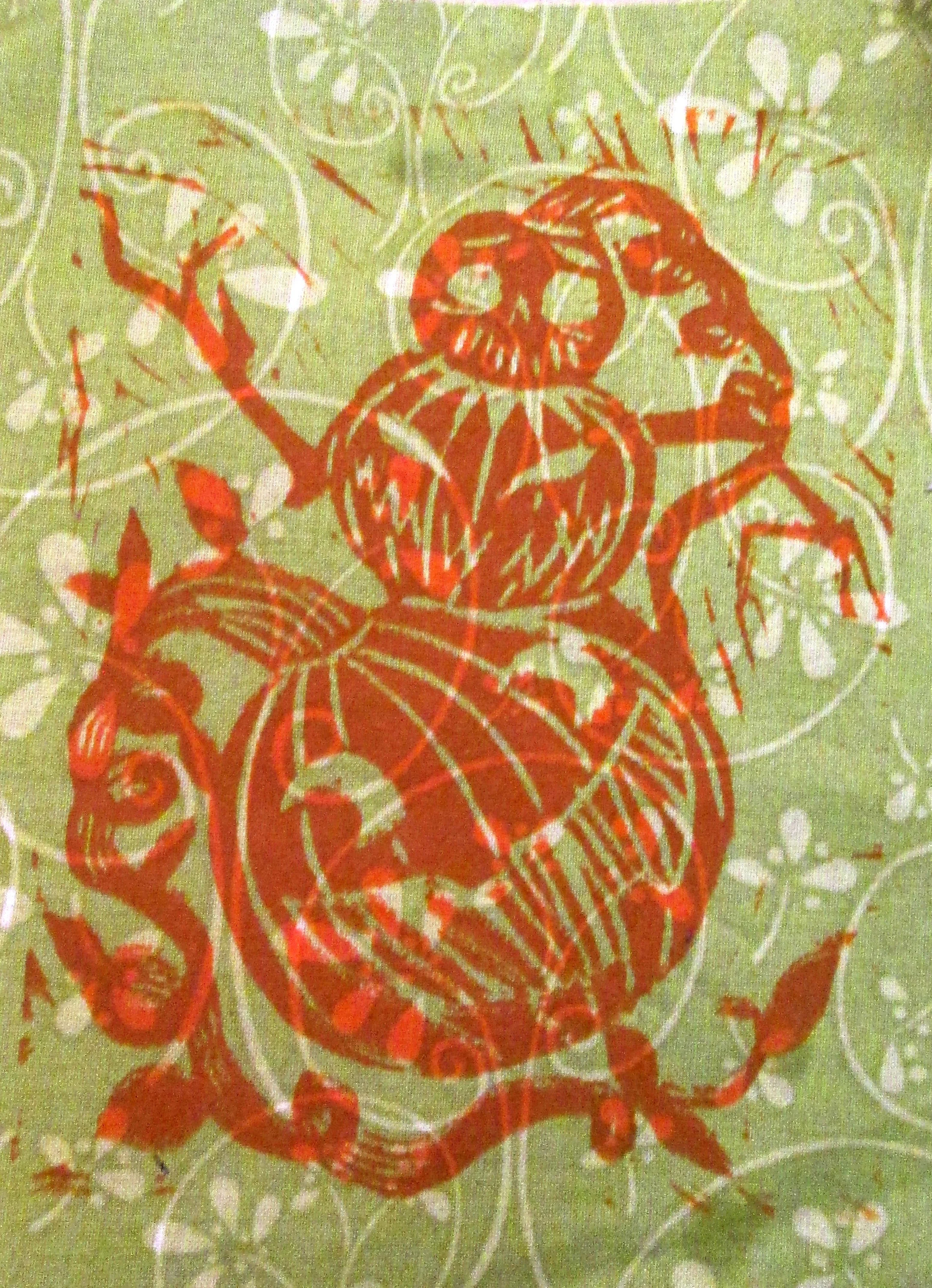 A red skeletal figure with wings, standing on one leg, with a pumpkin-shaped body and a skull for a head, on a green background with white floral and dotted patterns.