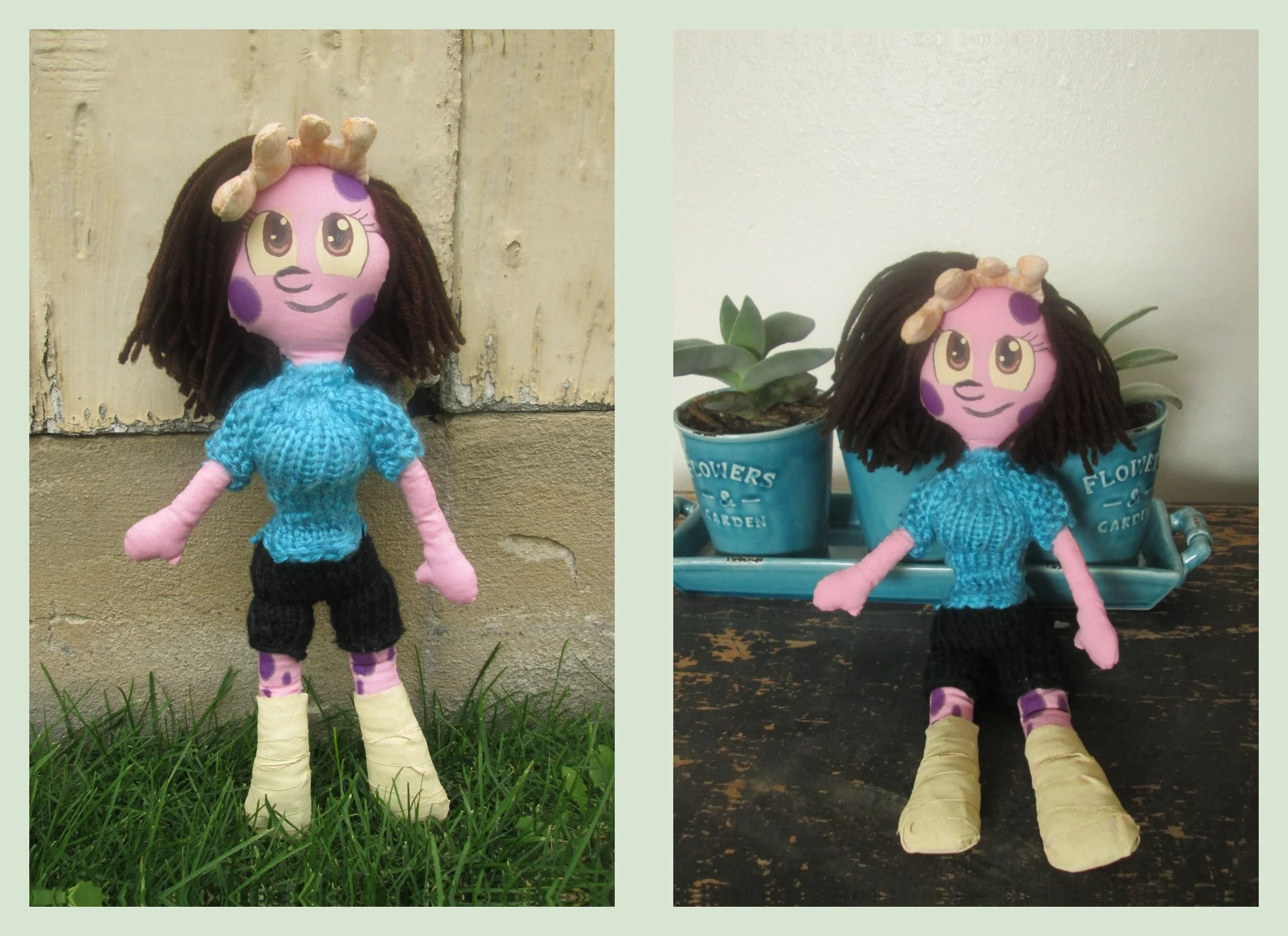 A sock doll with pink skin and purple spots, brown yarn hair, dressed in a blue sweater, black pants, and yellow boots, standing outdoors on grass next to a beige wall on the left, and inside on a wooden surface next to potted plants in blue flower p