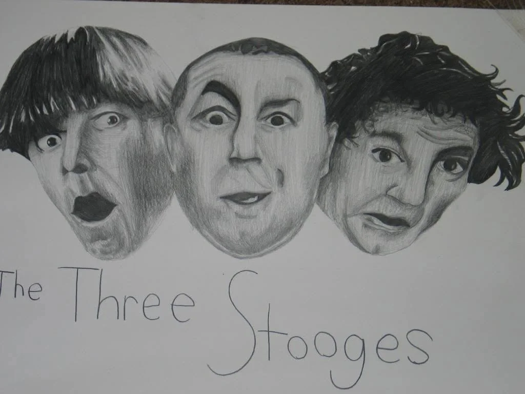 Drawing of the three Stooges' heads with surprised expressions, labeled 'The Three Stooges'.