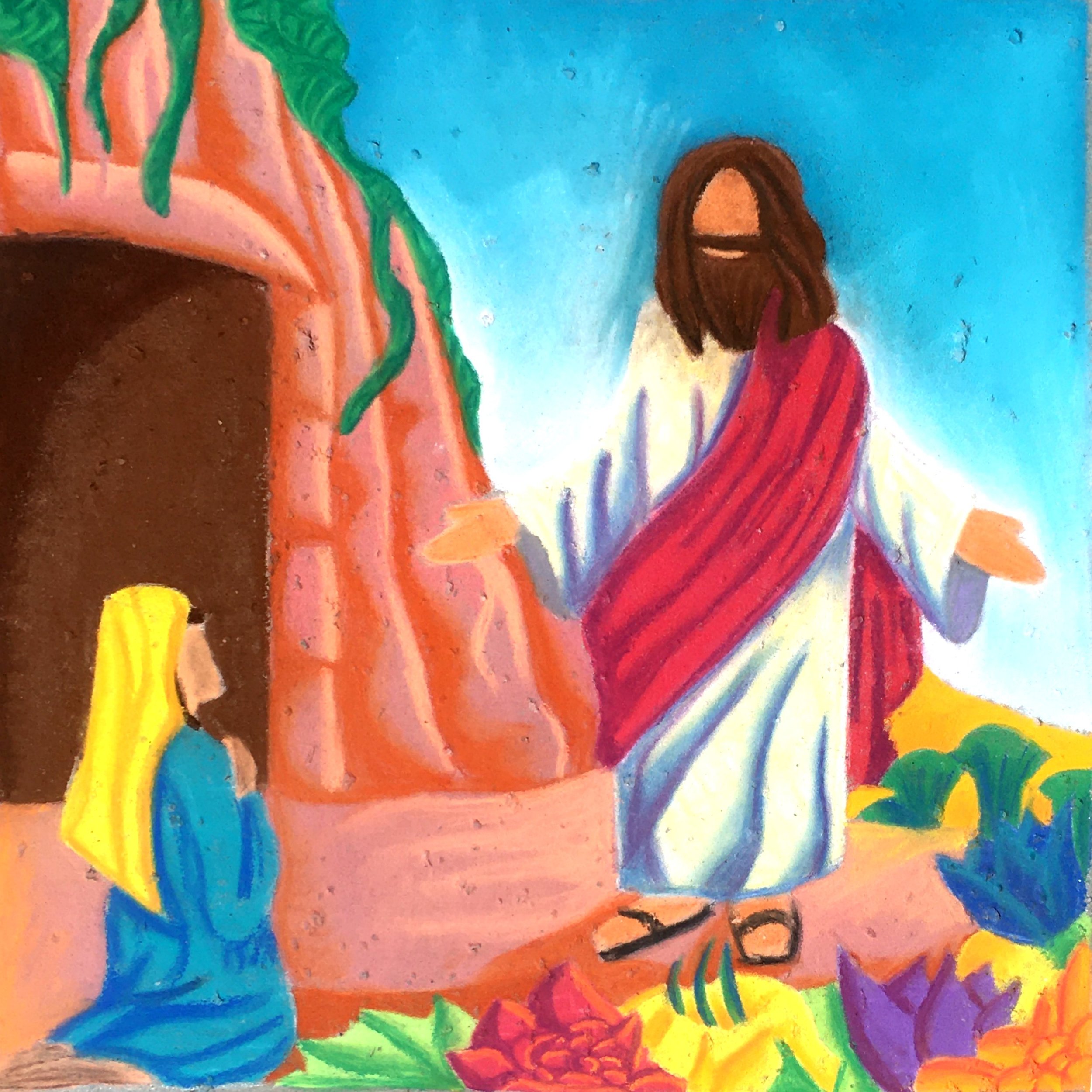 Colorful drawing featuring a girl with brown hair in a red dress, a bright orange sun, and a rainbow with clouds against a blue sky.