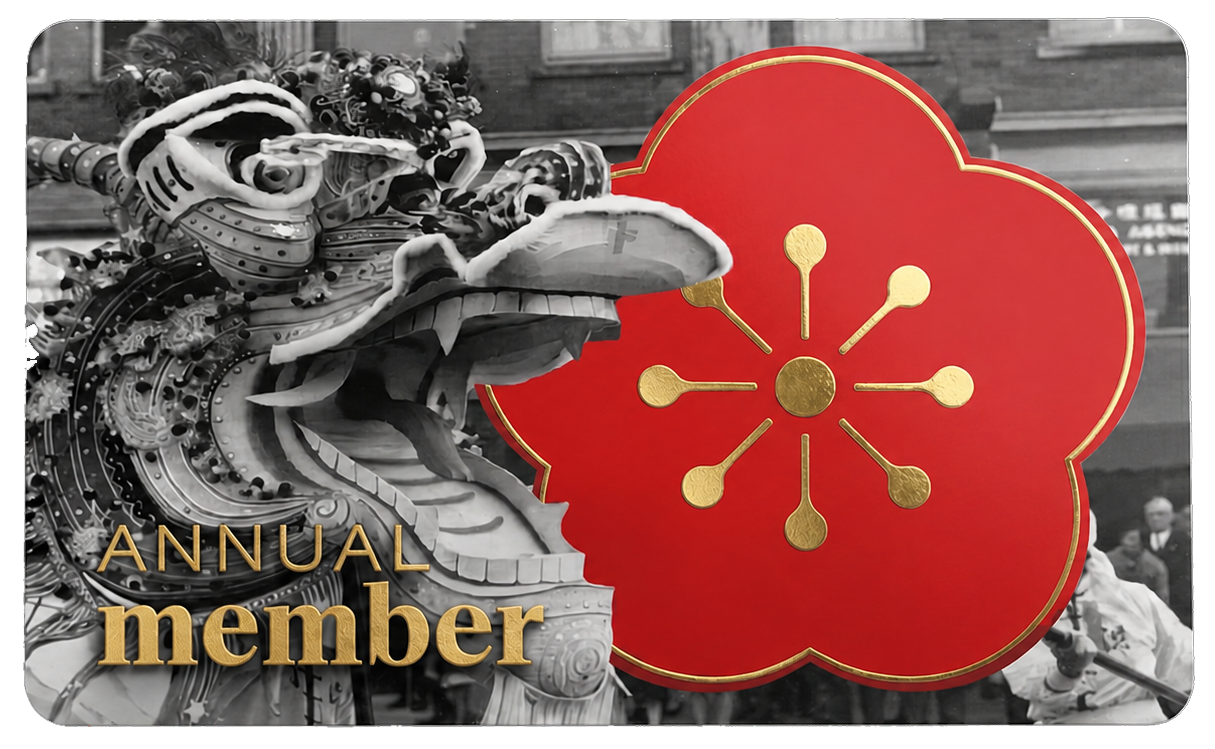 Black and white photo of an ornate dragon sculpture on a building, with a red and gold emblem shaped like a flower or cloud, and the text 'Annual Member' in gold at the bottom left.