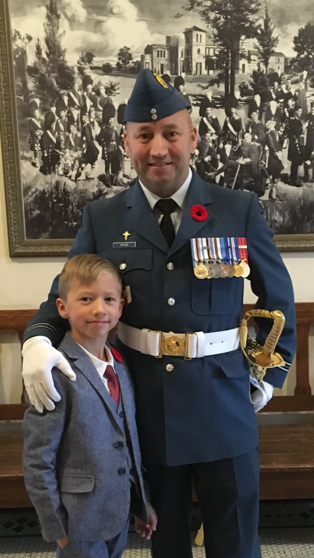 AdamJWebb in RCAF uniform with his son on Remembrance Day.