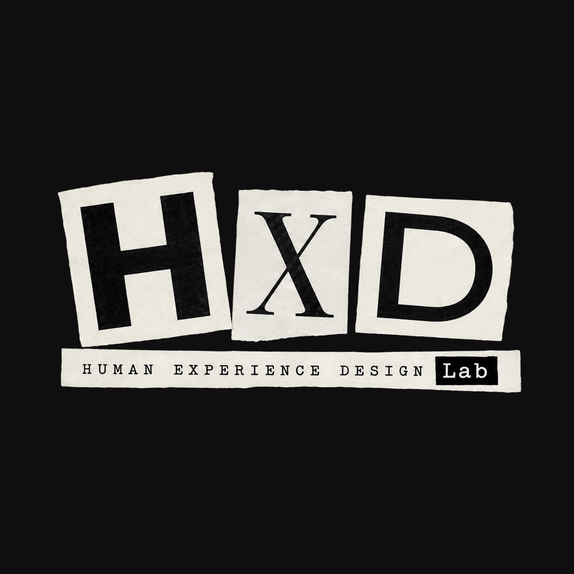 Carteles en papel que forman la palabra 'HIXD' con las letras 'L', 'V', 'D' y 'X' en letras negras.