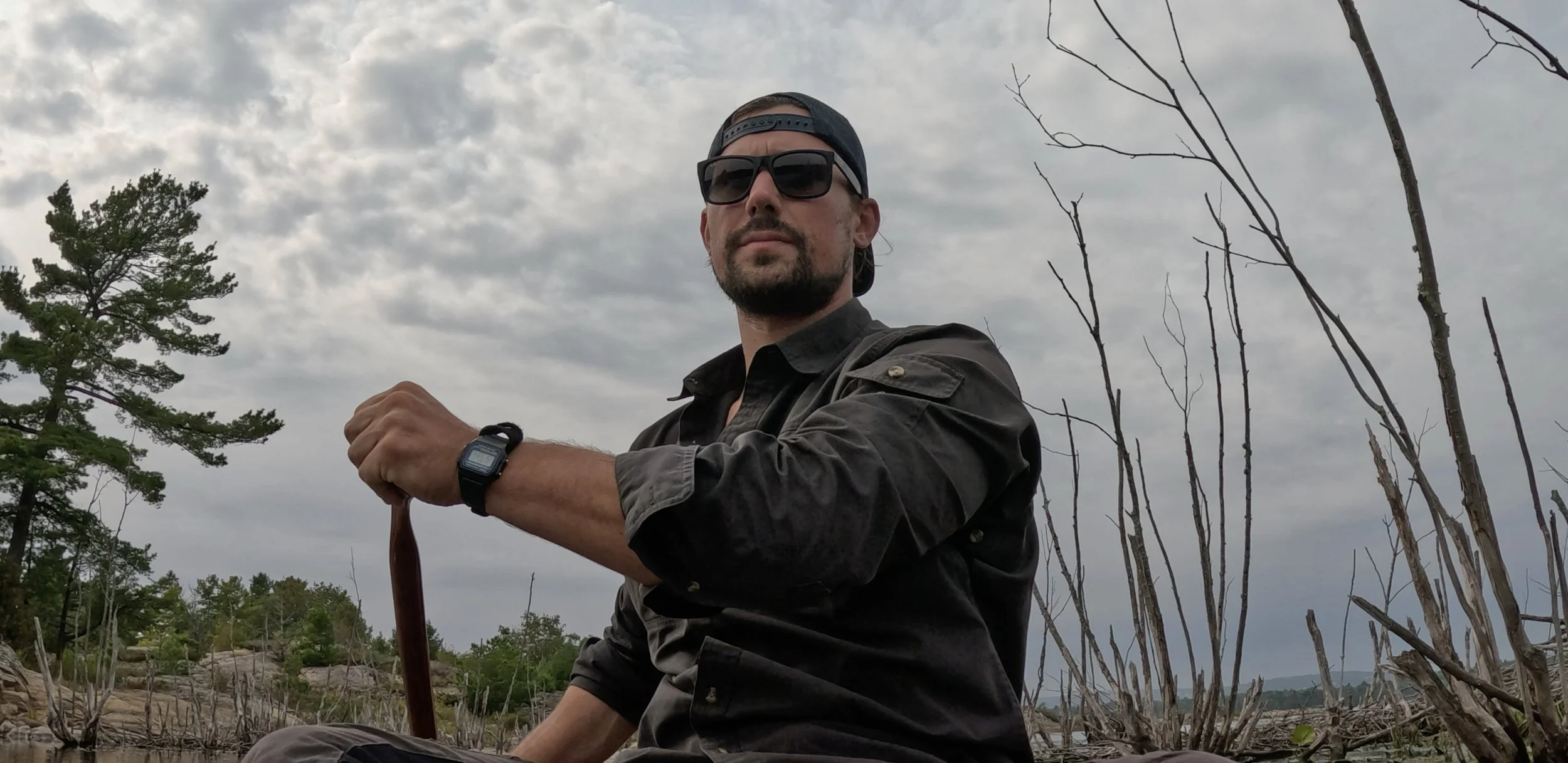 Contemporary Canadian landscape artist Kyle Boggild canoeing through Northern Georgian Bay.