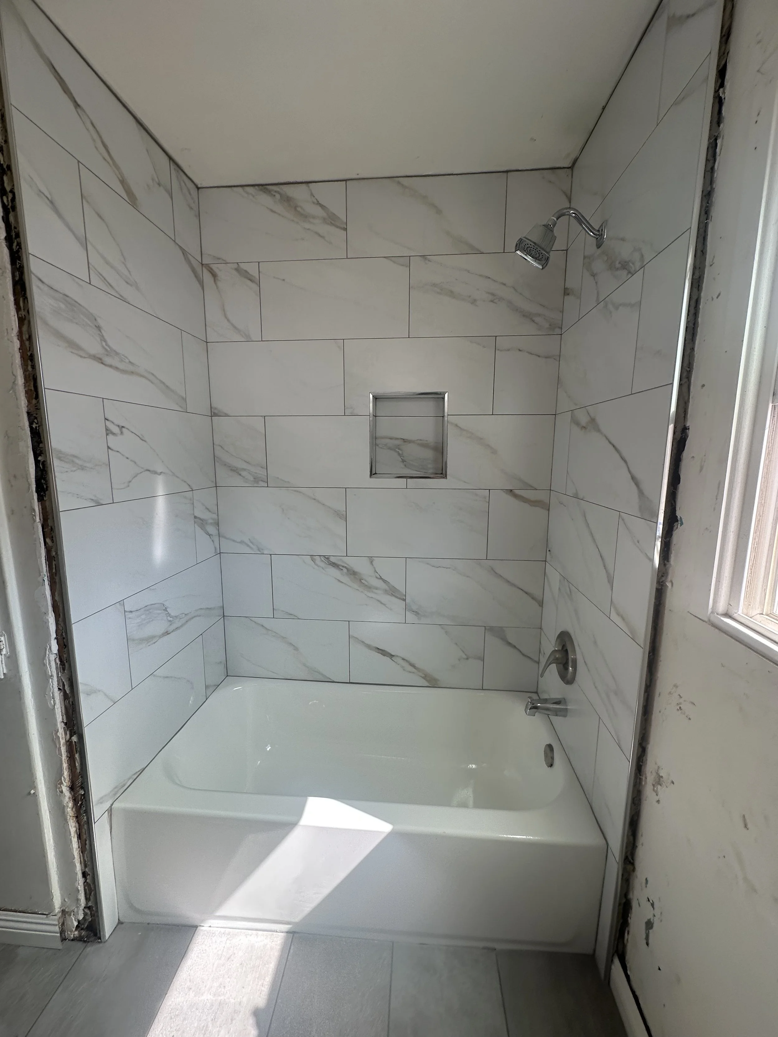 Bath tub tile installation