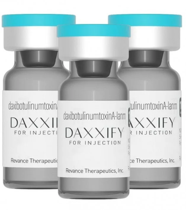Three vials of Daxxify, a botulinum toxin injectable for medical use, with blue and white caps and white labels featuring black text.