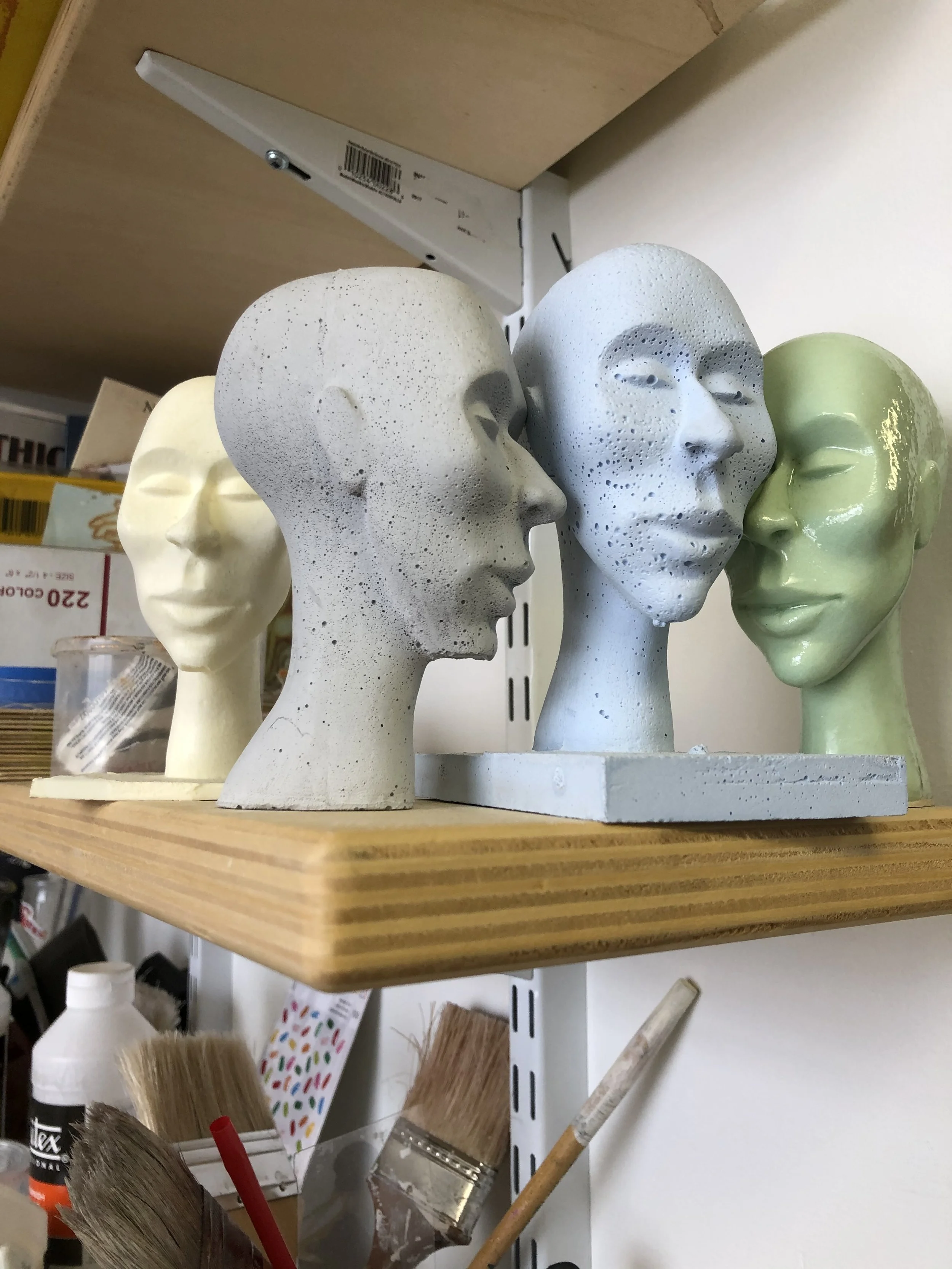 Multimedia test castings from green foam carving at right