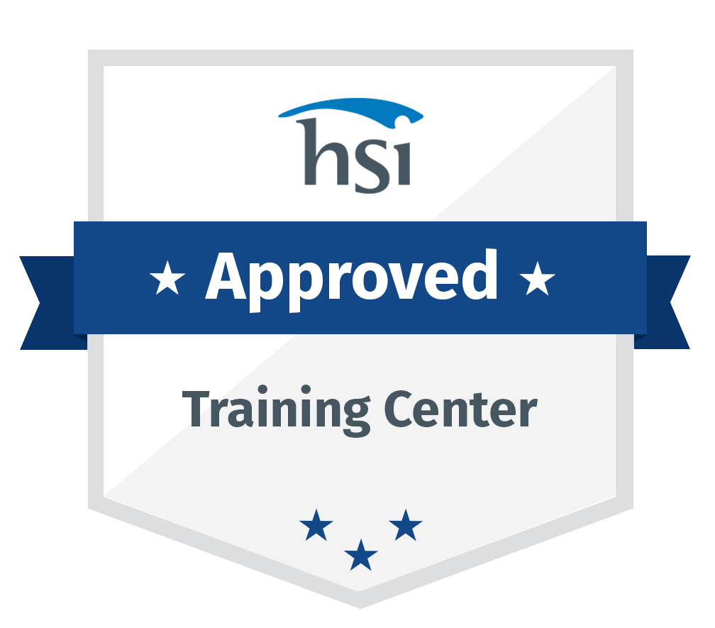 Badge with the logo 'hsi' at the top, a blue ribbon with white text saying 'Approved' in the middle, and black text below that says 'Training Center', with five stars at the bottom of the badge.