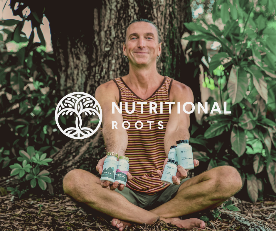 A smiling person sitting outdoors cross-legged in front of a tree, holding bottles of dietary supplements with a logo that reads "Nutritional Roots" and a tree symbol.