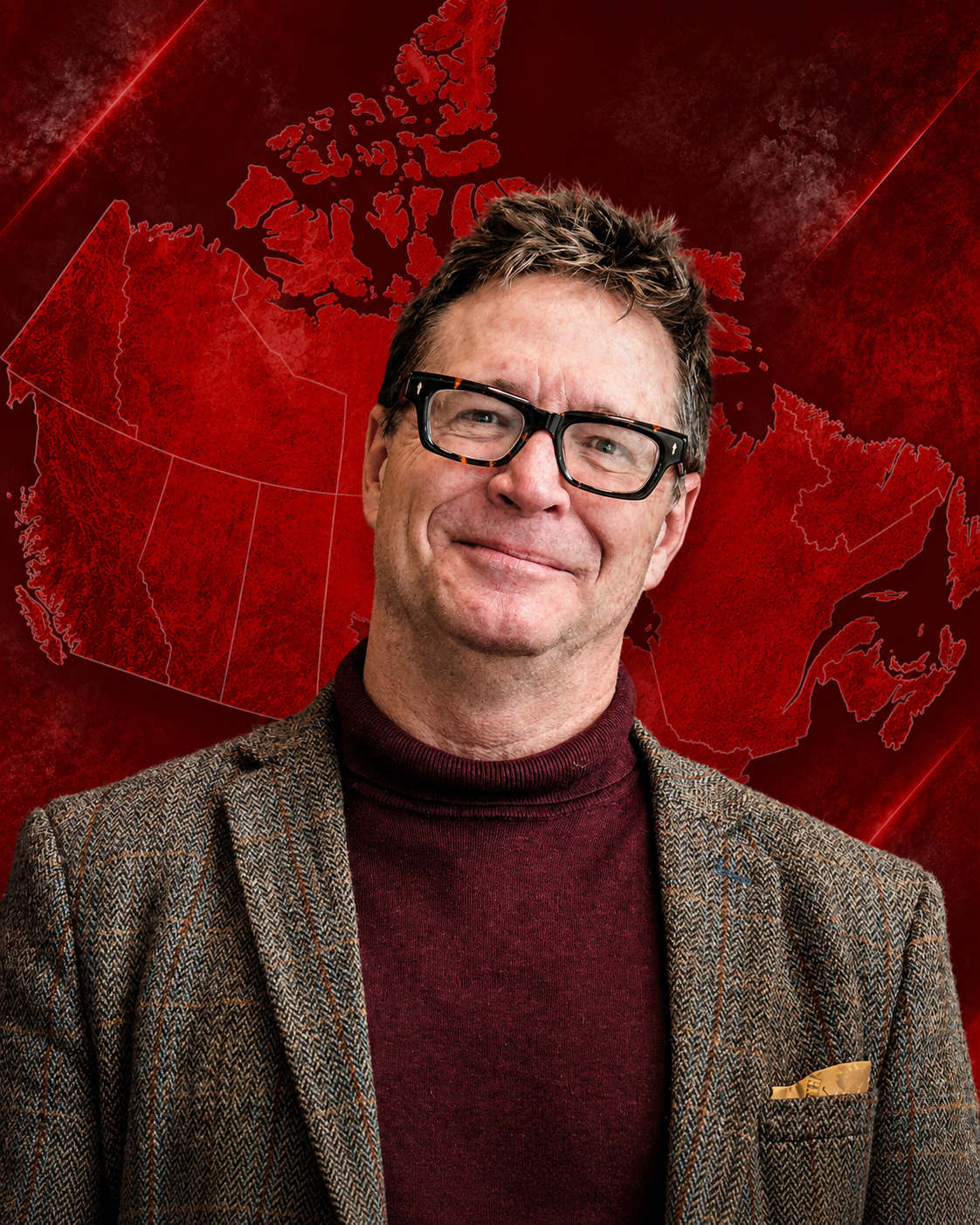 A man with glasses smiling in front of a red map of Canada.