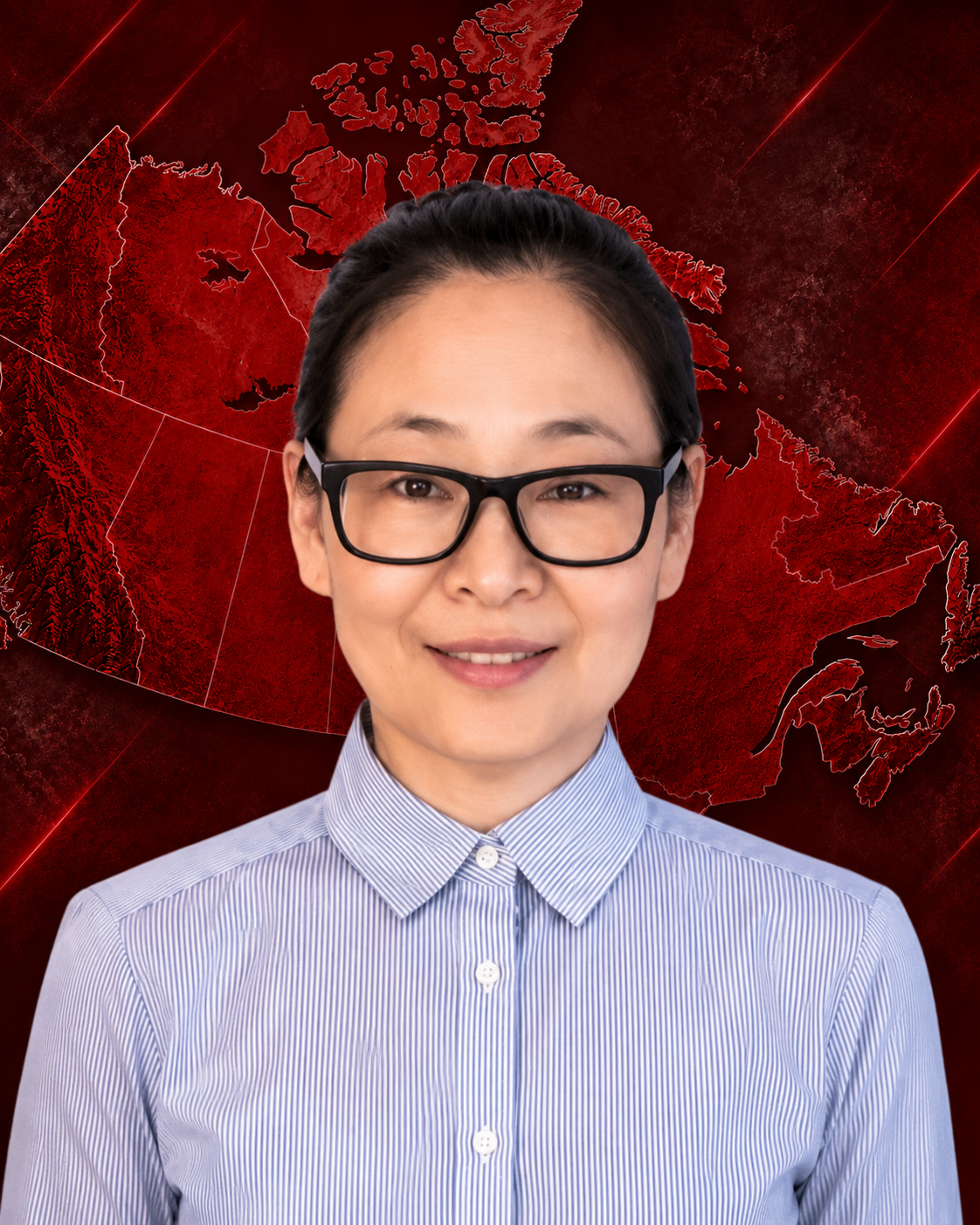 A woman with glasses and black hair in a bun, wearing a blue and white striped shirt, smiling against a white background.