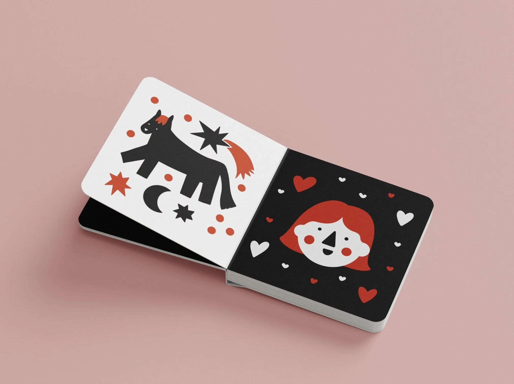 Two cards with graphic designs featuring a black unicorn with red accents and a white face with red details, and a stylized red and white Mary Jane shoe with hearts, set against a pink background.