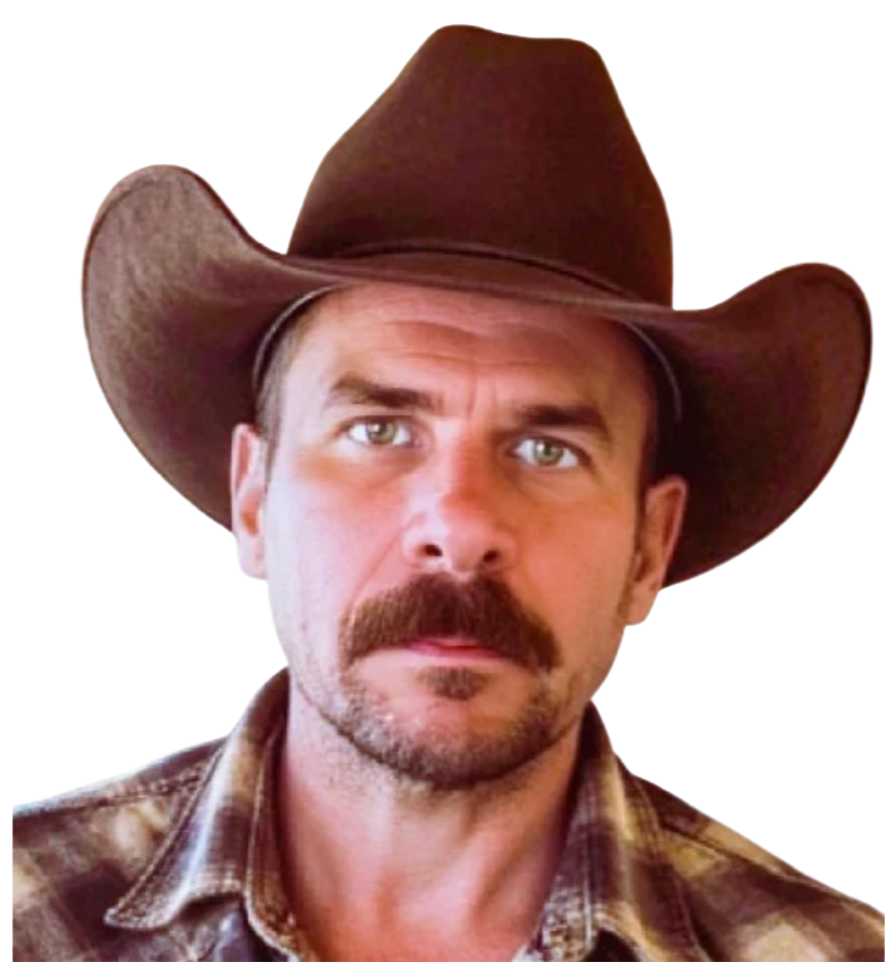 A man wearing a brown cowboy hat and plaid shirt.