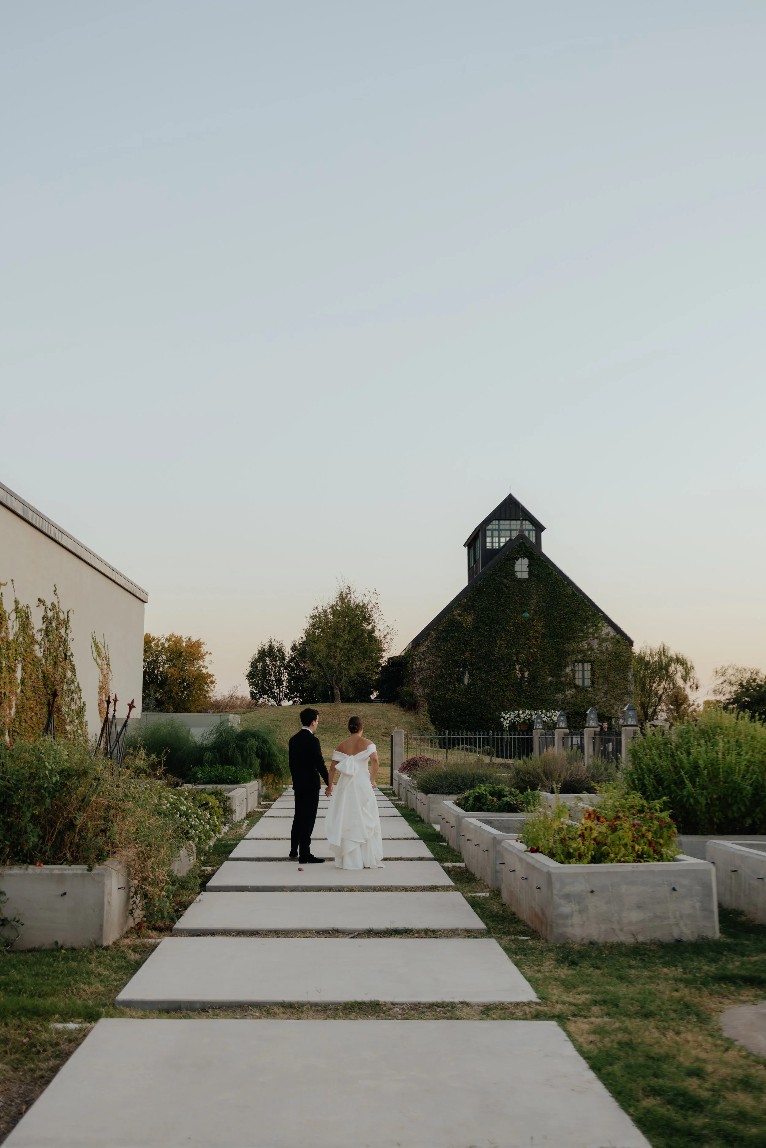 Soft coloured evening candid photo of bride and groom
