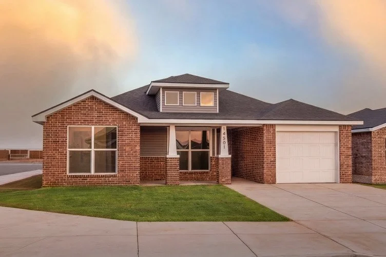 A brick Betenbough home at sunset. Curb appeal and a clear explanation of included features help buyers understand what makes a resale stand out.