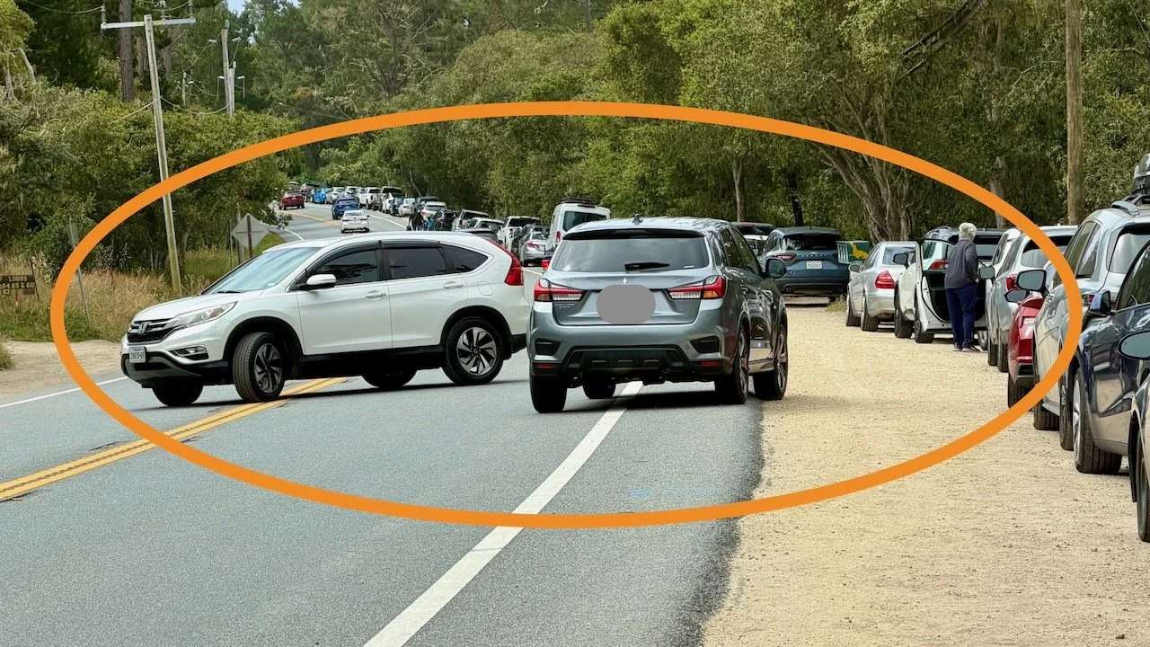 Cars jockeying for position to grab a parking spot send vehicles in all directions.