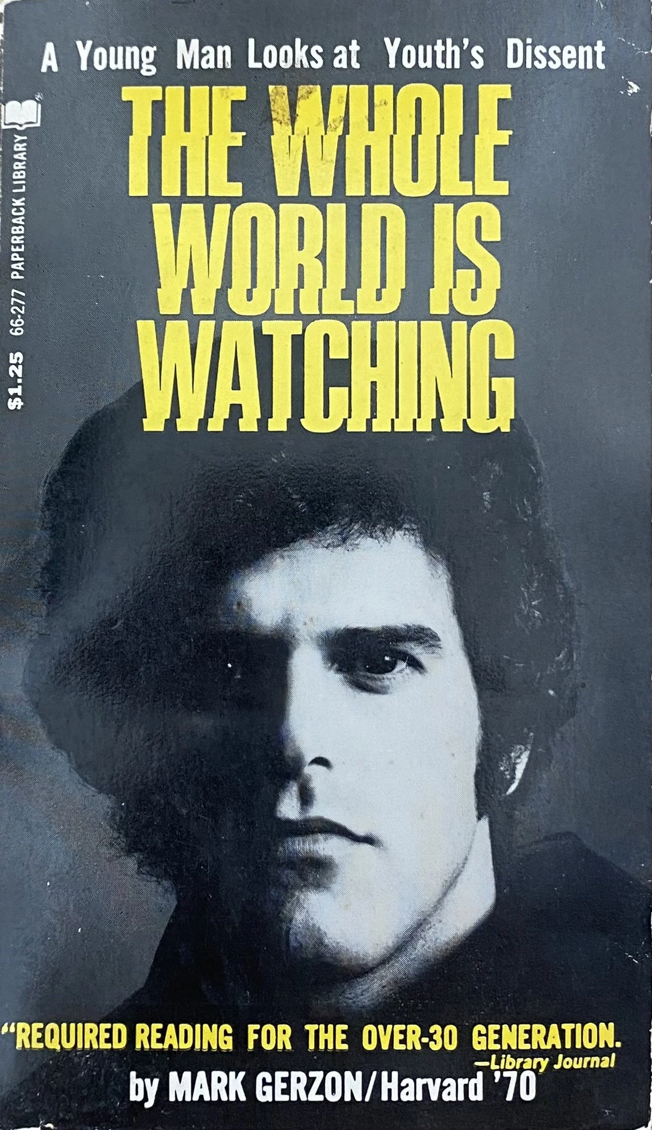 A black and white portrait of a young person with dark hair. The top portion of the image contains text that reads: 'A Young Man Looks at Youth's Dissent THE WHOLE WORLD IS WATCHING'. Additional text at the bottom indicates the book is 'REQUIRED READING FOR THE OVER-30 GENERATION' by Mark Gerzon, Harvard '70.