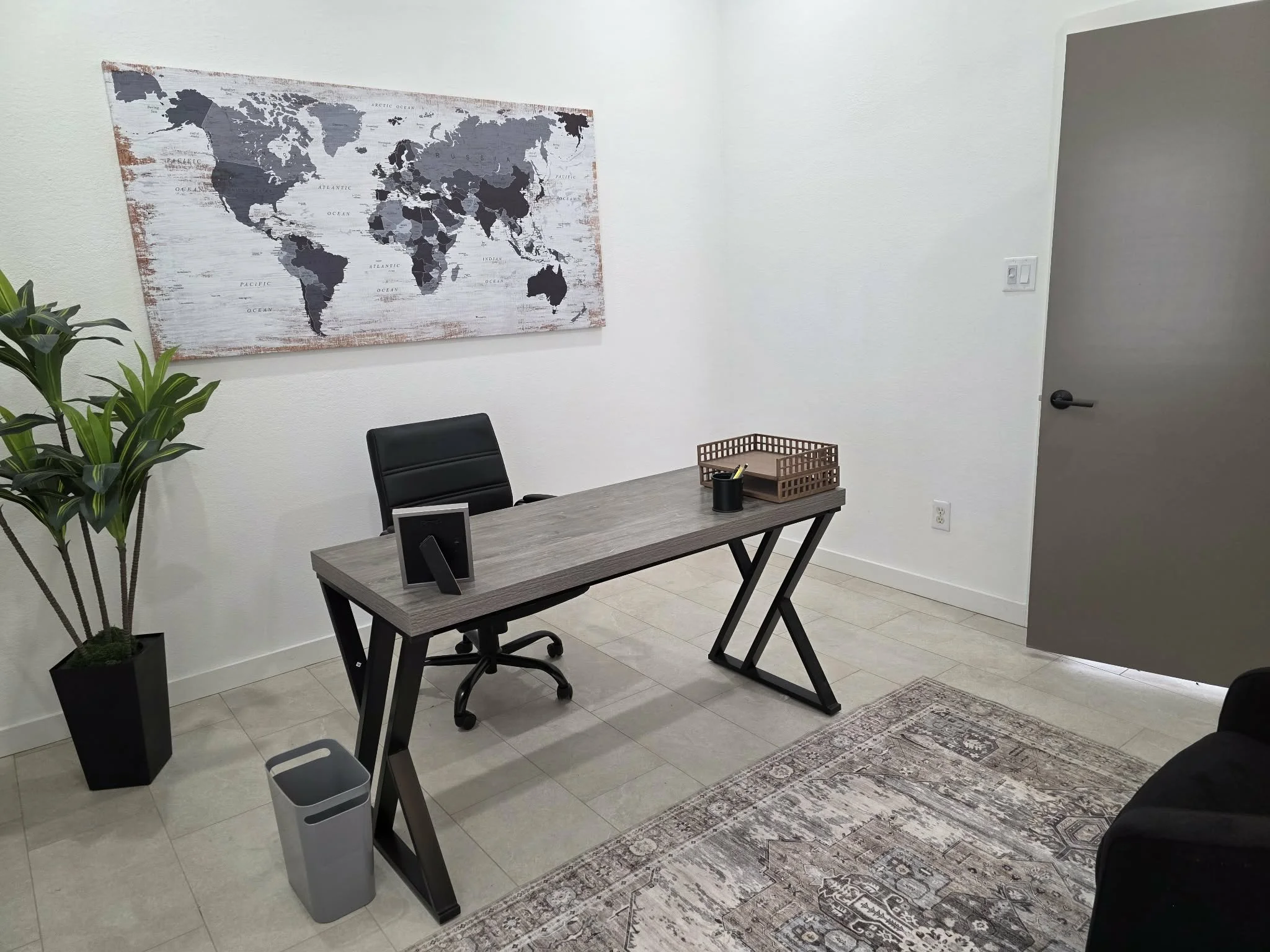 Professional private office rental with desk, seating, and business workspace in Arlington, Texas.
