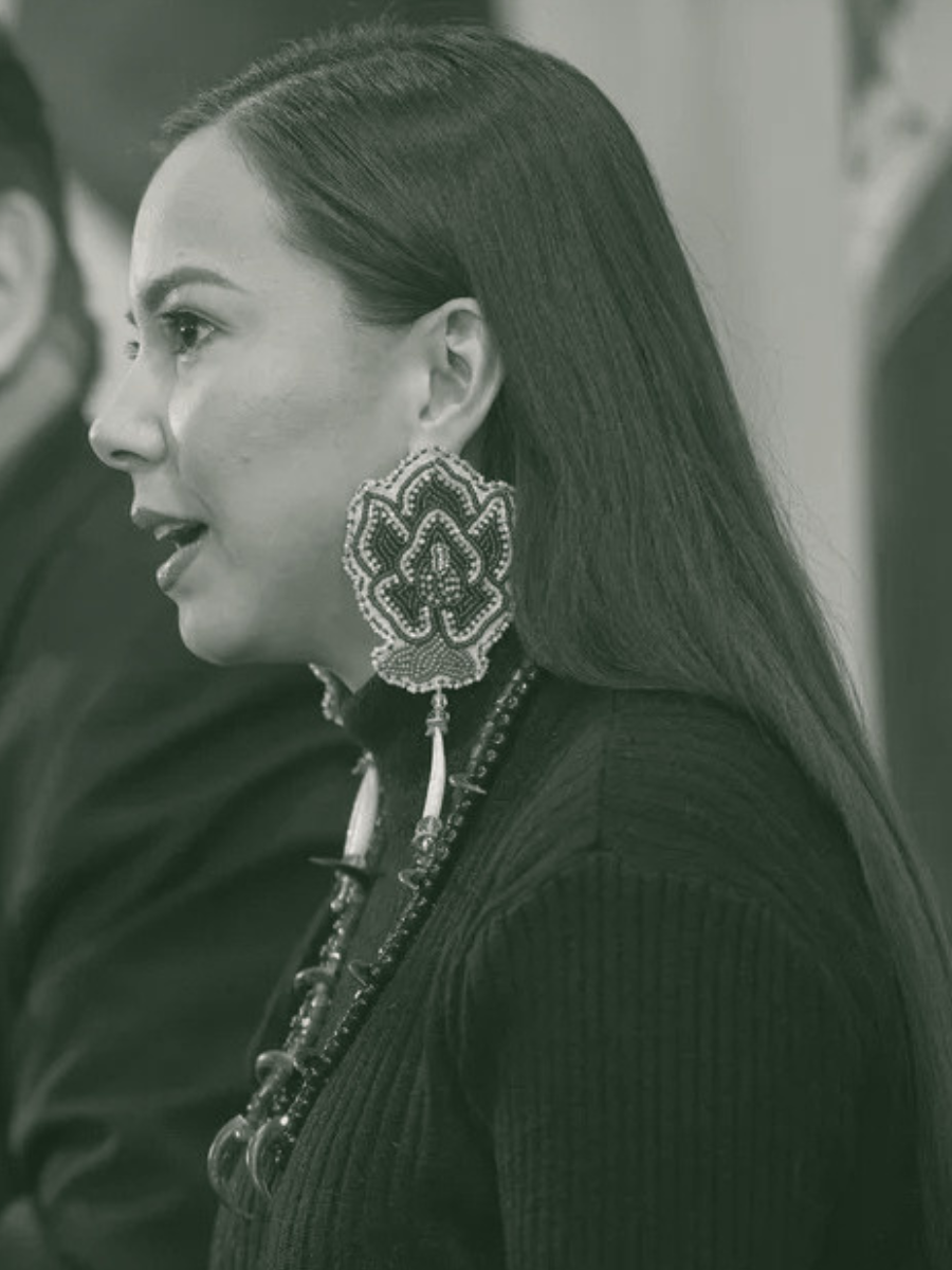 Side profile of a Katisha Paul advocating for Indigenous rights and the protection of integrity. Katisha Paul speaking at press conference.