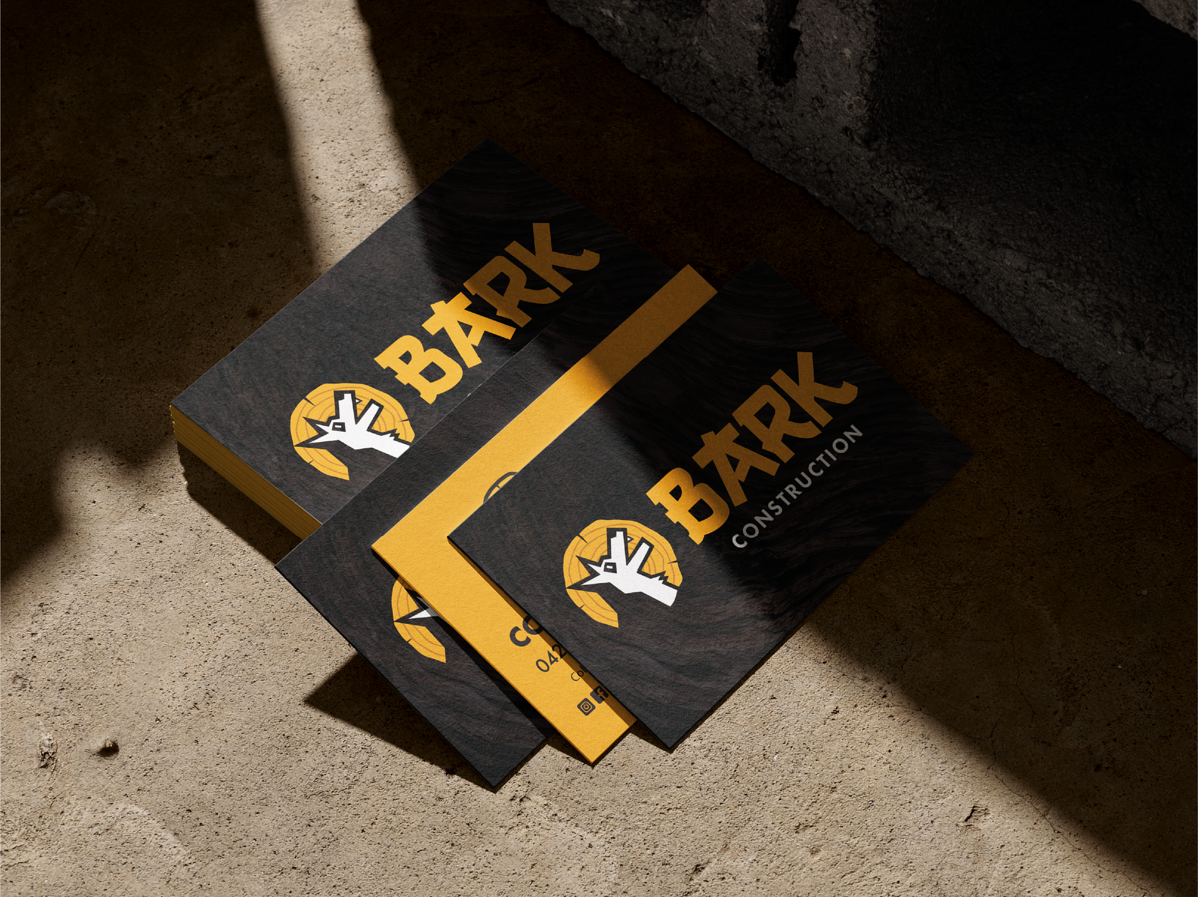 Business stationery and site signage designed to extend the Bark Construction brand across everyday client touchpoints, creating a consistent and recognisable visual identity.
