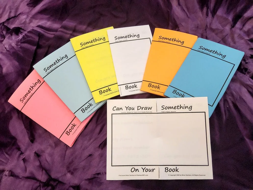 Picture of Brian Garrison's picture booklet, several of them in bright colors,, "Something Book."