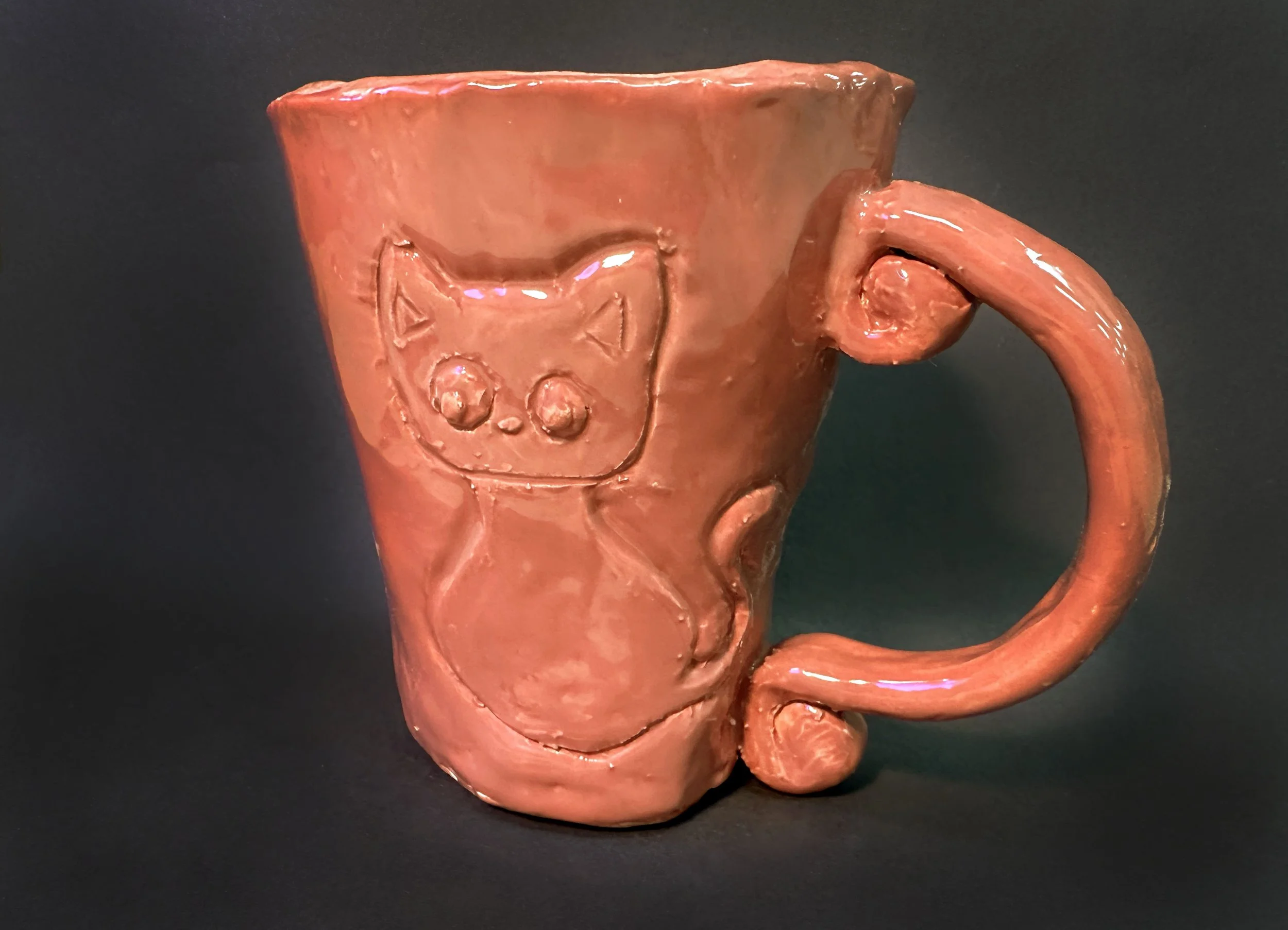 A student engraves her pet