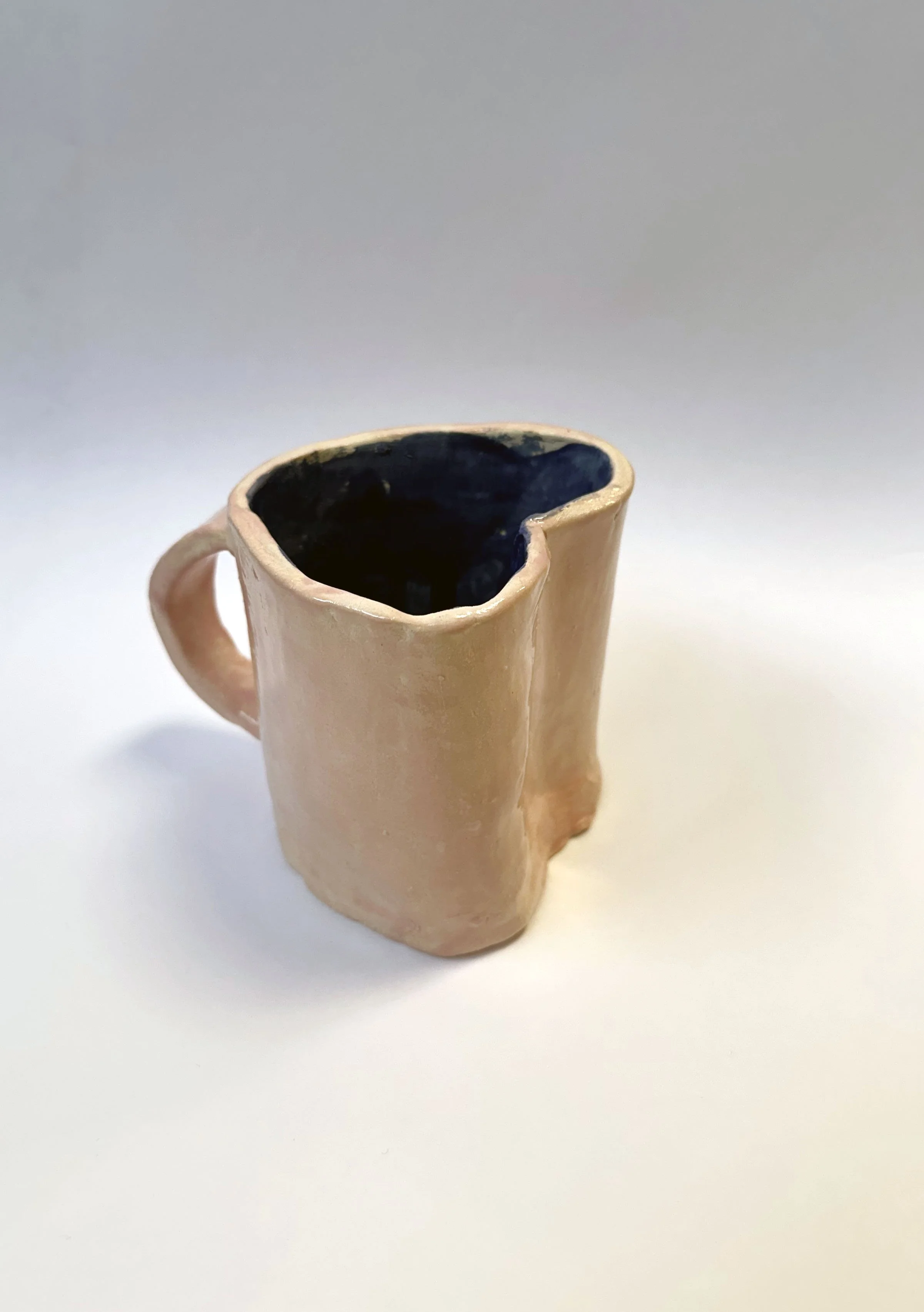 A student shows her love of ceramics