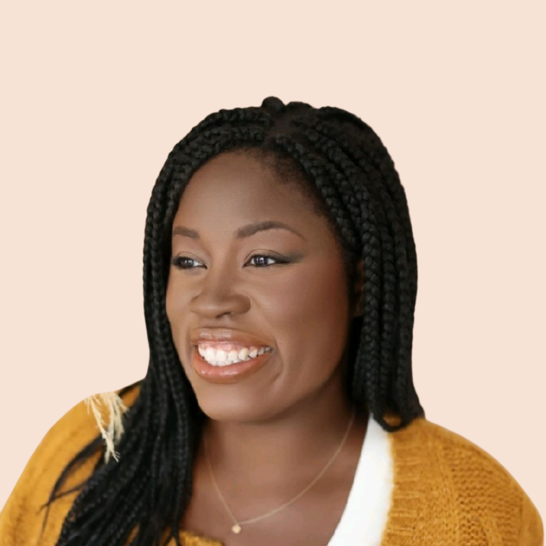 Close-up of a young woman with braided hair, smiling, wearing a yellow cardigan and a silver necklace with a small pendant, against a neutral beige background.